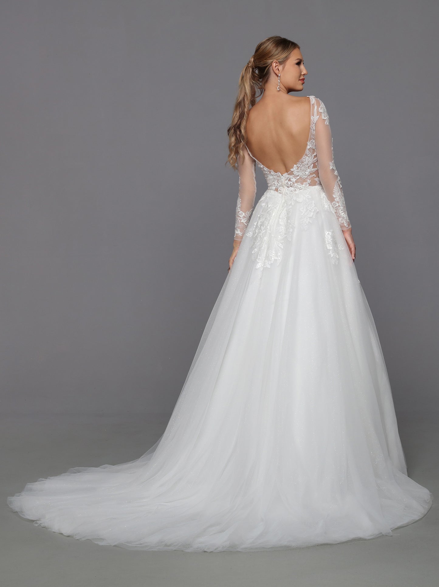 DaVinci Bridal 50769 A-Line Ballgown Illusion High Neck Long Sleeve Floral Lace Train Wedding Gown. Convertible dresses are always on-trend, like this lush ball gown with sheer full-length sleeves highlighted with rich lace applique. The alluring low scoop back is balanced by the modest bateau neckline.