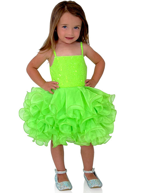 Enjoy dazzling elegance with Marc Defang 5144 Short Crystal Cupcake Pageant Dress. Showcasing gorgeous shimmer organza layered ruffle cupcake skirt, this dress is sure to make your little one feel like a royalty. Perfect for any special occasion, this beautiful gown is ideal for your baby or kids.  Sizes: 0M, 6M, 12M, 18M, 2T, 3T, 4T, 5T, 6T  Colors: Neon Green, Neon Pink