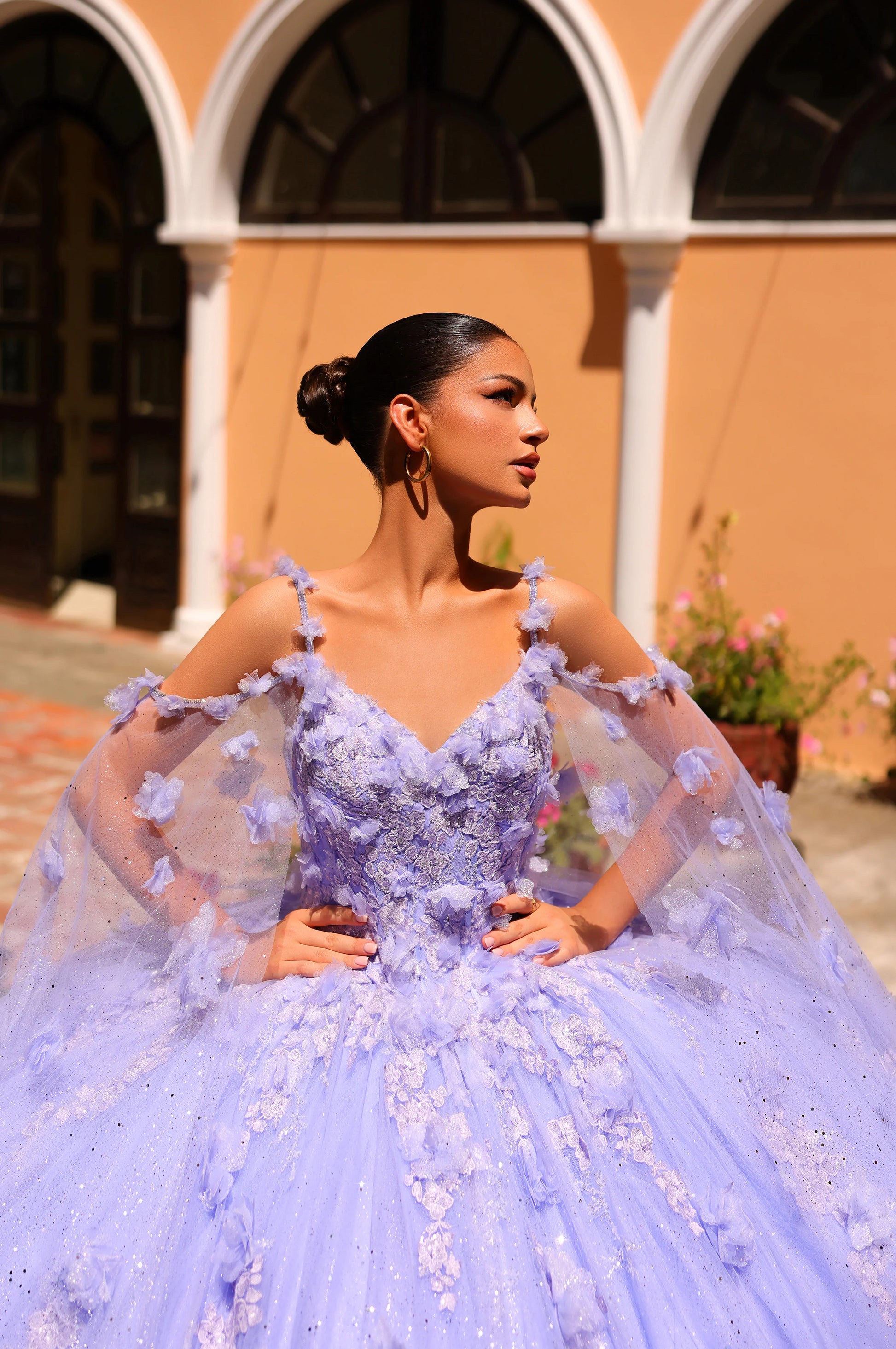 Expertly crafted for your special event, the Amarra 54254 quinceanera Dress features a stunning sequin lace design with a beautiful cape sleeve and intricate 3D flowers. The ball gown train adds a touch of elegance to this must-have dress. Perfect for making a statement and standing out at any occasion.&nbsp;