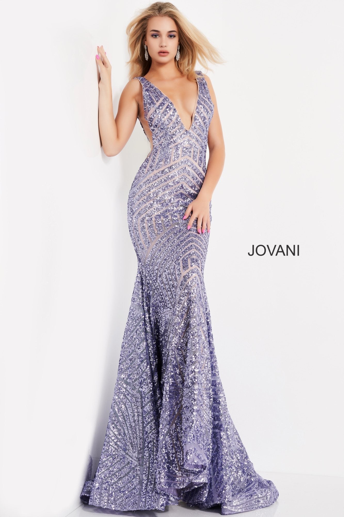 Long Jovani 59762 Prom Dress, Featuring a plunging neckline & A Fully sequined Fitted Mermaid Bodice. This Open V Back Pageant Gown & prom dress is perfect for the stage is has a lush trumpet sequin embellished skirt and sweeping train. 