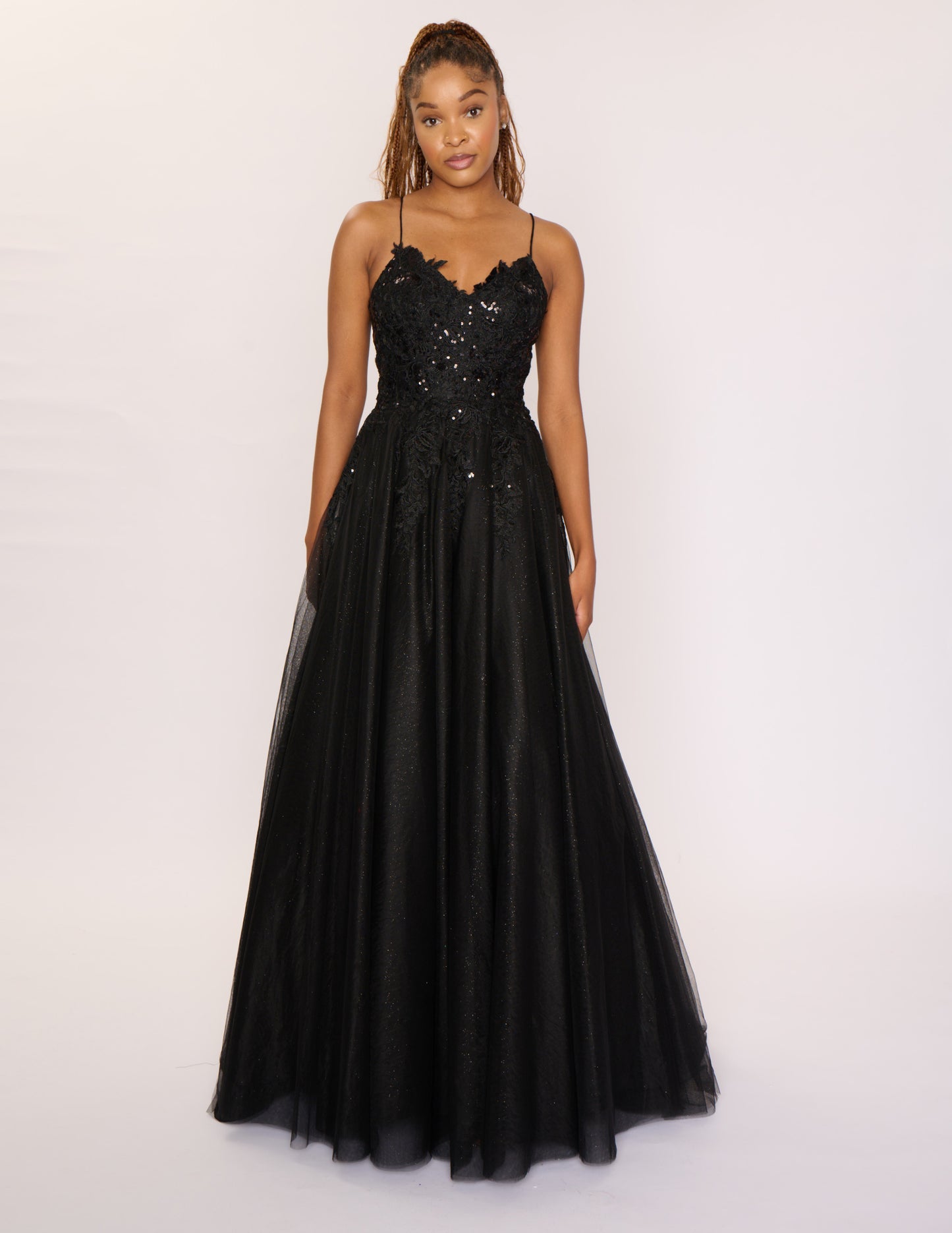 Expertly crafted by Nina Canacci, the 6624 Long A Line dress features a flattering corset bodice and a stunning backless design. The elegant train and A-line silhouette make it the perfect choice for prom, pageants, or any formal event. Elevate your style with this timeless and beautifully designed gown.

Sizes: 4-14

Colors: Black, Red, Light Blue