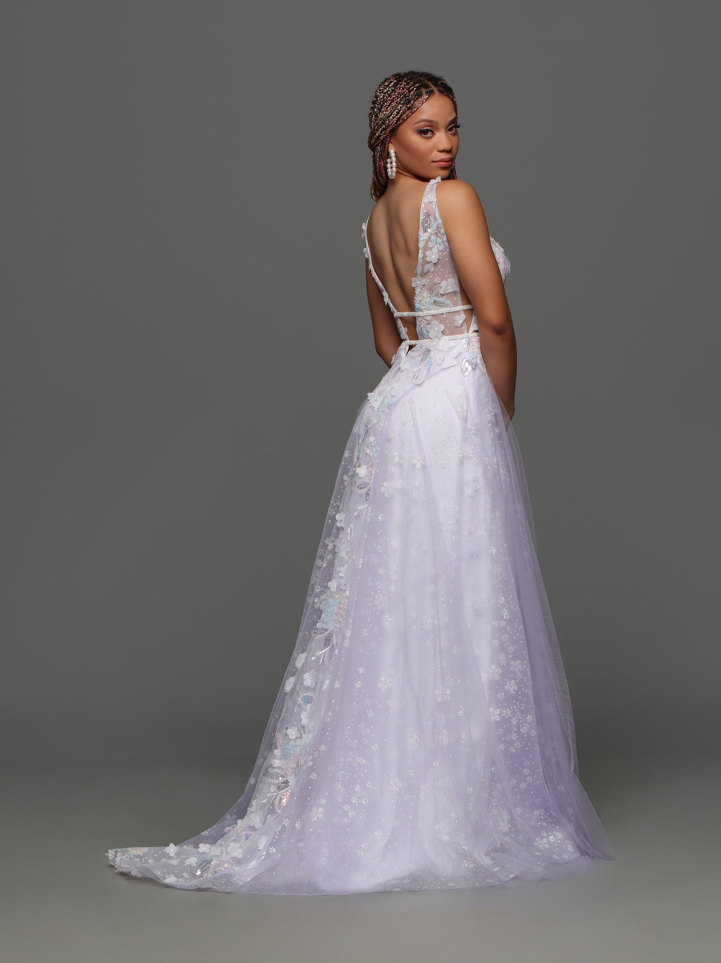 Get ready to turn heads in the Candice Wang 72308 Sheer Shimmer A Line Maxi Slit Prom Dress. The floral pastel design and sheer fabric create a breathtaking effect, while the A-line silhouette and high leg slit offer a flattering fit. Perfect for any formal occasion, this gown will make you feel confident and elegant.