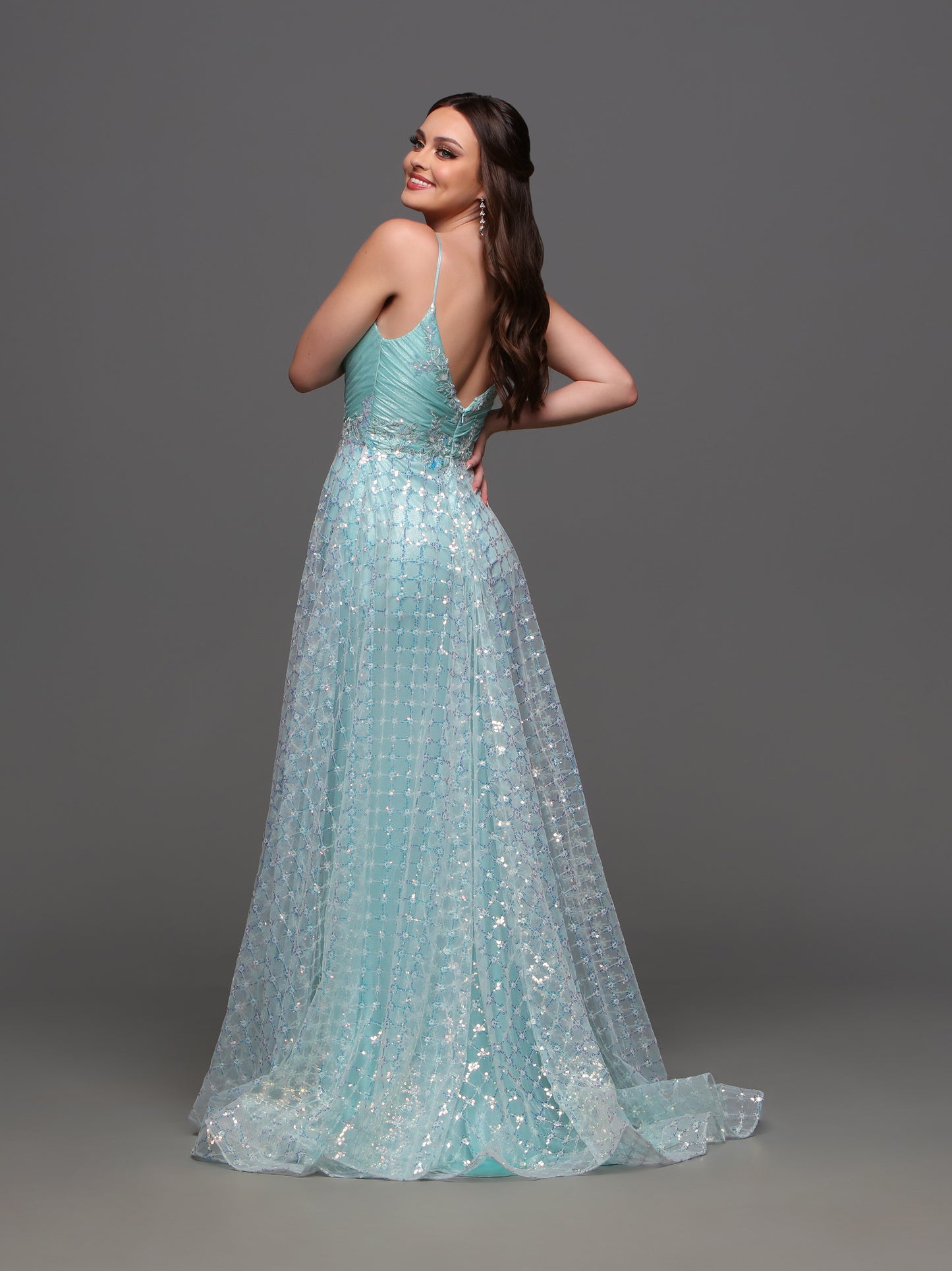 Upgrade your formal look with the Candice Wang 72332 Long Sequin A Line Prom Dress. The shimmer of sequins paired with the elegant V neck lace detail creates a showstopping look. The A line silhouette flatters all body types. Perfect for prom or any formal event.  Sizes: 4-20  Colors: Mint