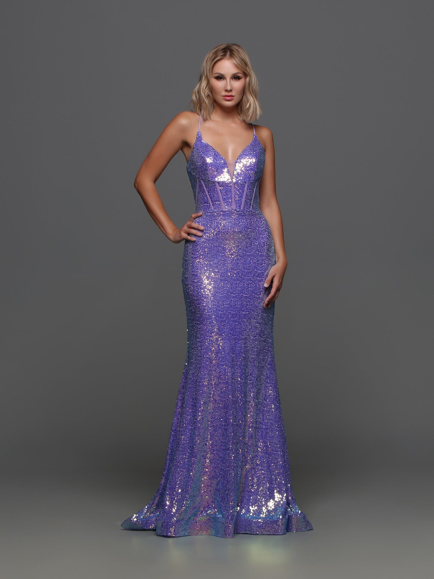 The Candice Wang 72377 Sequin V Neck Prom Dress features a fitted sequin silhouette with a stunning sequin V-neck corset bodice. The Detachable pleated tulle skirt adds layers for a full and luxurious look. Perfect for prom or any special occasion.  Sizes: 0-20  Colors: Purple, Pink