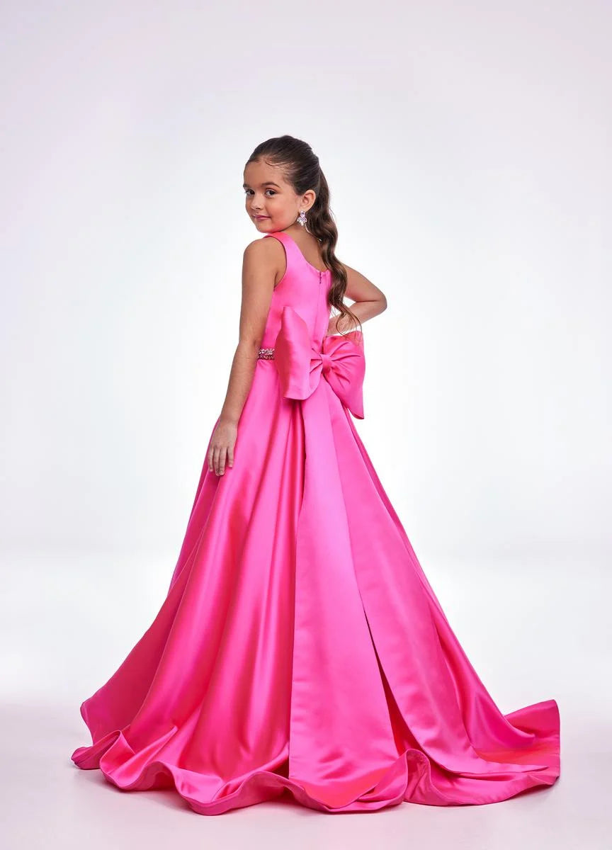 This Ashley Lauren 8079 Size 12 Ivory Long satin A Line girls Pageant Dress features an elegant crew neckline, a crystal encrusted waistline, and an A-line skirt that is complemented by a detachable bow at the back. Perfect for formal occasions, this high-quality gown will make your little girl look beautiful.  Size: 12  Color: Ivory