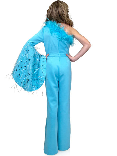 This Marc Defang 8222K Jumpsuit features a one-shoulder design with long bell sleeve and feather detailing for a sophisticated look. Crafted with a scuba fabric, this formal wear is perfect for pageants and special occasions. The slim-cut silhouette creates a stunning, head-turning look. 