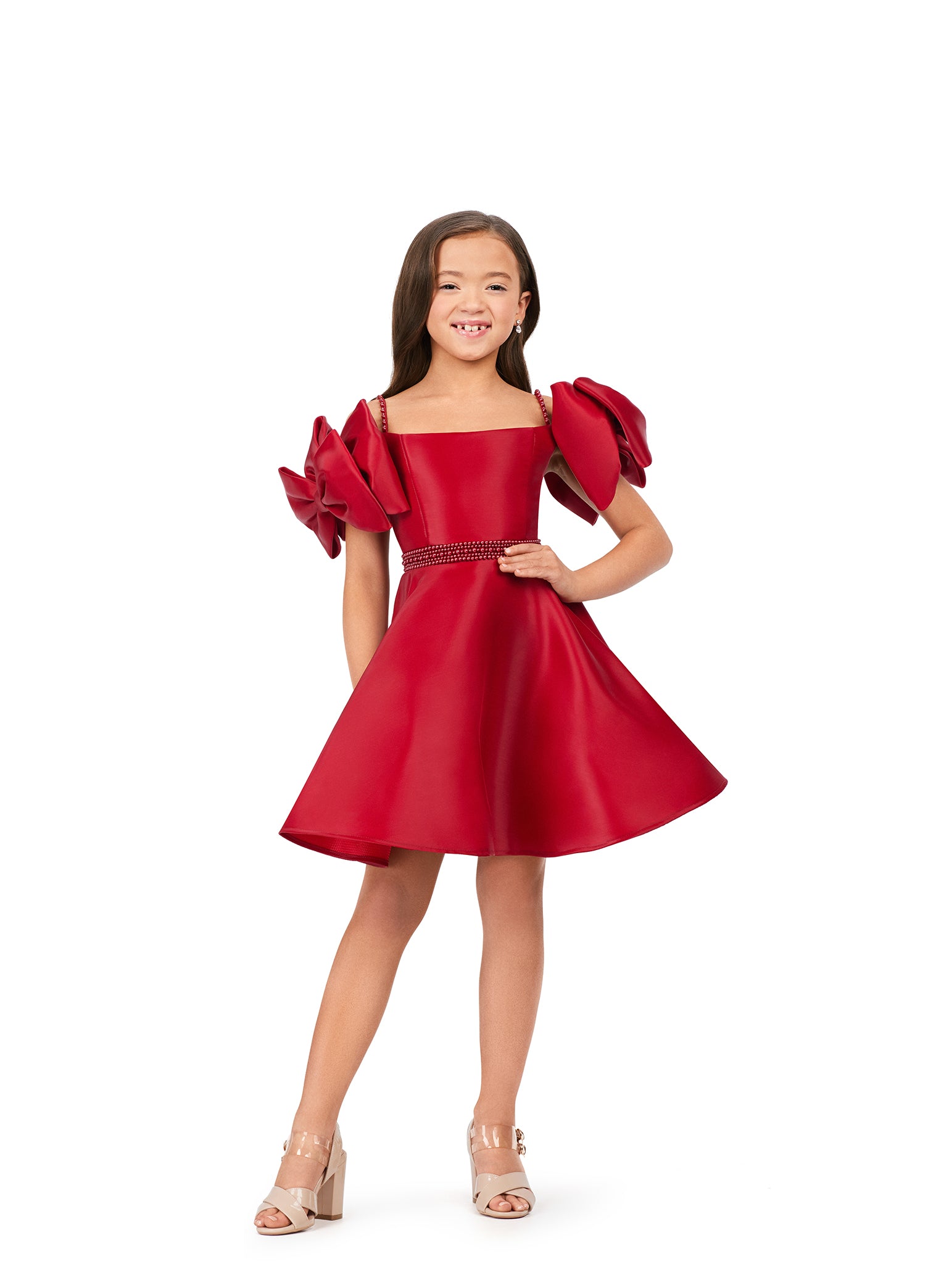 Ashley Lauren Kids 8223 Off The Shoulder With Bows A-Line Beaded Belt Detail Phantom Satin Coctail Dress. Cuteness overload in this fun satin dress! With its beautiful pearl belt and bow sleeves, this is a must for any little fashionista.