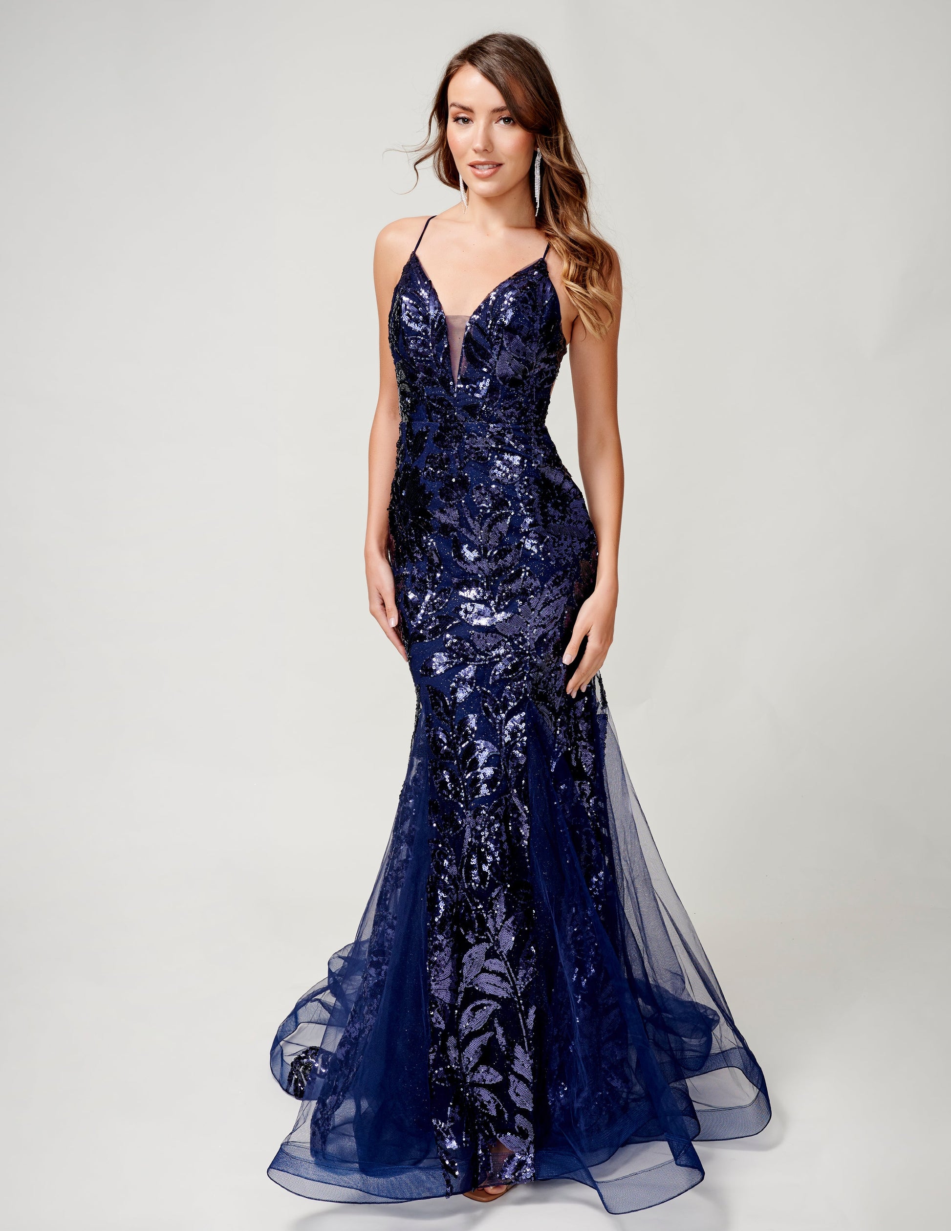 <p data-mce-fragment="1">This stunning Nina Canacci 8236 Prom Dress features a sequin mermaid design, highlighted by a backless corset and V-neckline. Perfect for formal events, this gown offers a flattering silhouette and elegant style. Shine and stand out at your next event with this must-have dress.</p> <p data-mce-fragment="1">Sizes: 0-12</p> <p data-mce-fragment="1">Colors: Pink, Navy, Orange</p>