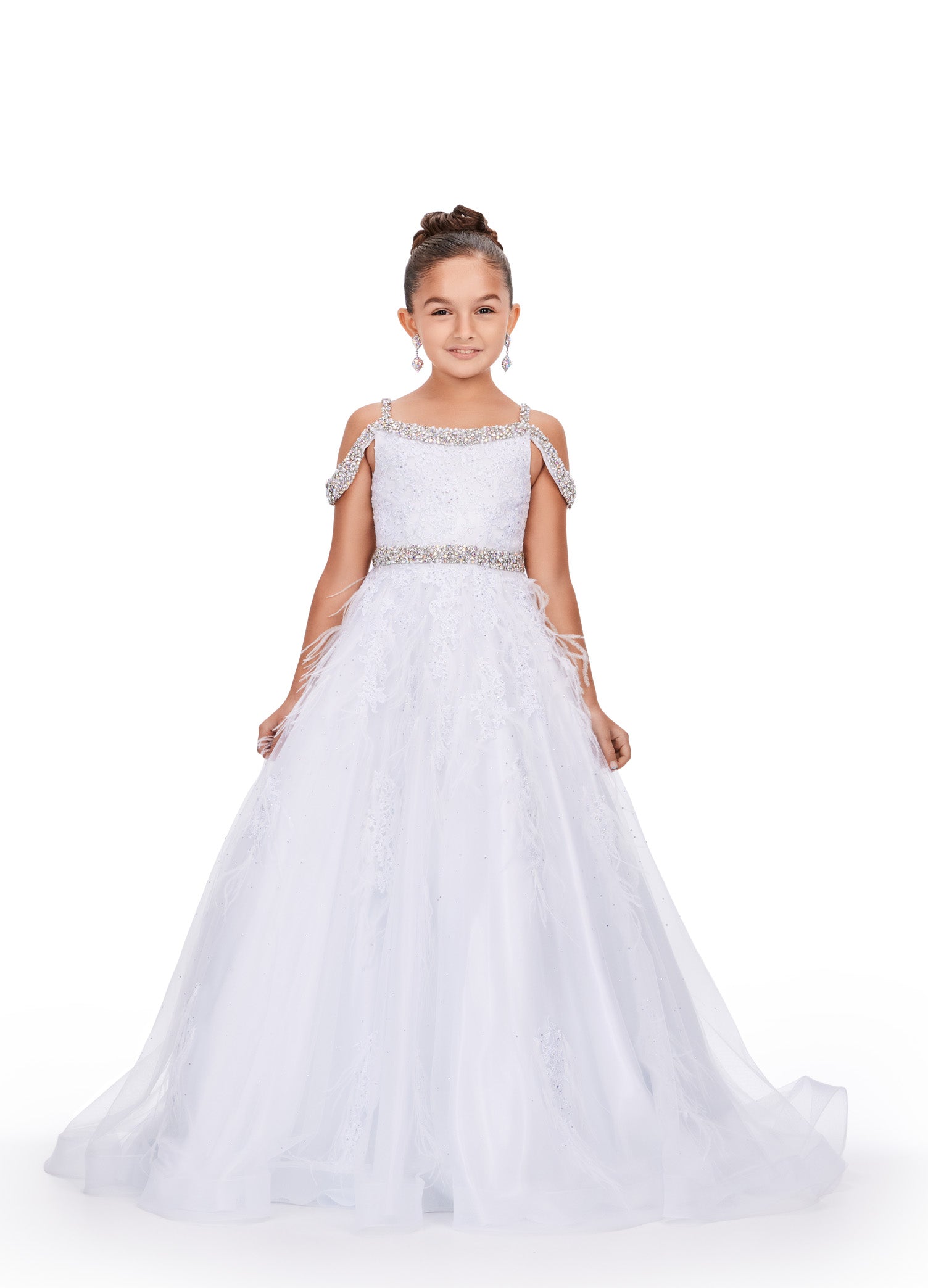 Experience the epitome of elegance and grace with the Ashley Lauren Kids 8242 Girls Lace Feather Pageant Dress. Featuring delicate lace and stunning feather accents, this off the shoulder ballgown is the perfect choice for any special occasion. Its impeccable design and craftsmanship will make your little girl feel like a true princess. This gorgeous kids gown is embellished with crystal beaded straps, neckline trim and belt. The dress is adorned with lace applique, press on stones and feather accents.