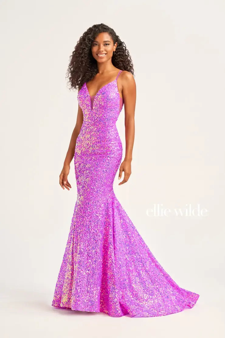 Look sophisticated and graceful in Ellie Wilde EW34016. The signature Iridescent color shifting sequins and mermaid silhouette make this timeless corset dress a perfect choice for a formal occasion. Captivate everyone in the room with its sparkling iridescent material and backless v-neckline.  Sizes: 00-20  Colors: ORANGE, LIGHT BLUE, HOT PINK, IRIS, FOREST LIGHT, PURPLE RAIN  https://dy9ihb9itgy3g.cloudfront.net/static/themes/EllieWilde/Spring_2023/EW34016.mp4