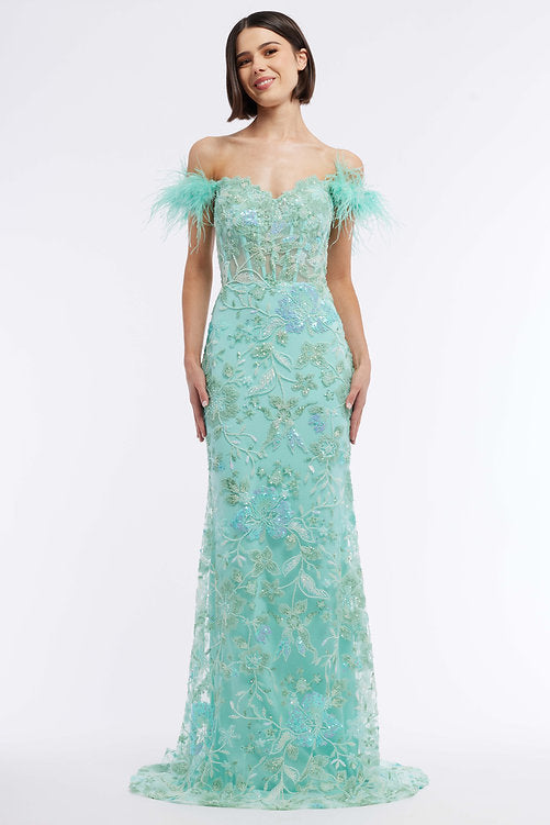 This exquisite Vienna Prom 8867 dress features a long sheer sequin corset for a modern, sophisticated look. This off the shoulder feather formal gown is embellished with intricate beading and sequins, giving it a glamorous feel perfect for a pageant or other special event. A timelessly elegant option for any wardrobe.  Sizes: 00-16  Colors: Blue, Green, Pink, Purple