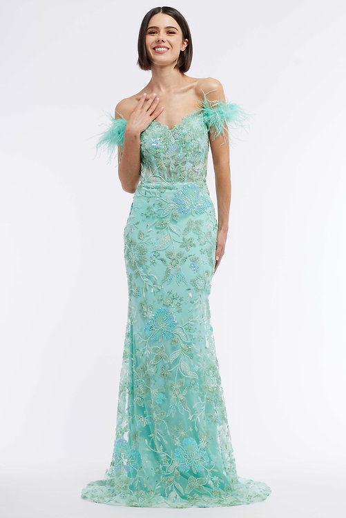 This exquisite Vienna Prom 8867 dress features a long sheer sequin corset for a modern, sophisticated look. This off the shoulder feather formal gown is embellished with intricate beading and sequins, giving it a glamorous feel perfect for a pageant or other special event. A timelessly elegant option for any wardrobe.  Sizes: 00-16  Colors: Blue, Green, Pink, Purple