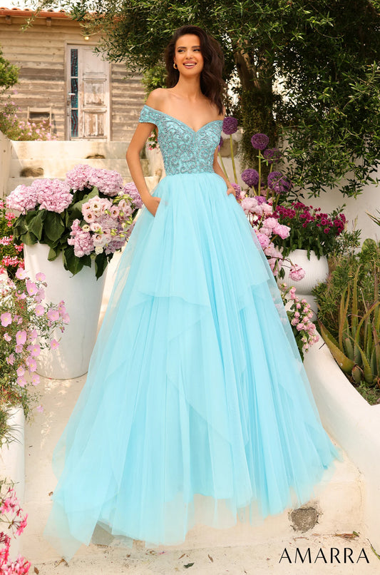 This dazzling prom dress radiates charm, romance and magic - all ingredients for a perfect prom night. The bodice is magnificently designed with labyrinthine rhinestone detail, highlighted by the off-the-shoulder sleeve and flirtatious sweetheart neckline that will capture the attention of anyone that beholds you. However, that is not the main piece of this gorgeous attire. 