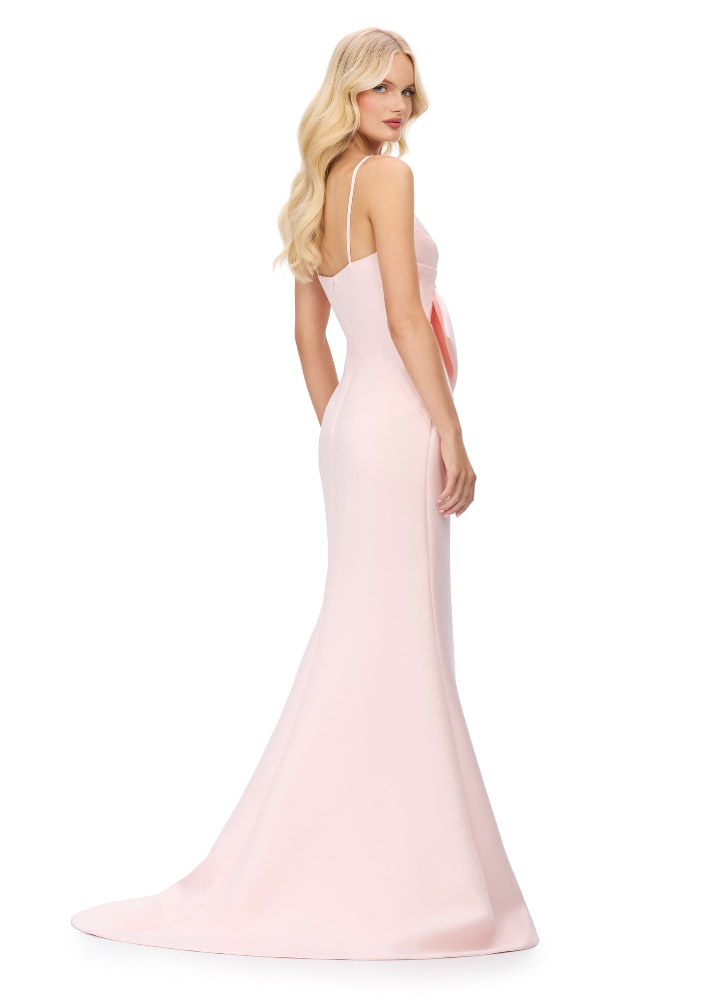 This Ashley Lauren 11702 evening gown boasts a striking large bow, spaghetti straps, and a flattering fit and flare silhouette. The bow bodice adds a touch of elegance, while the V neckline highlights your décolletage. Perfect for formal events and special occasions, this gown is sure to turn heads.