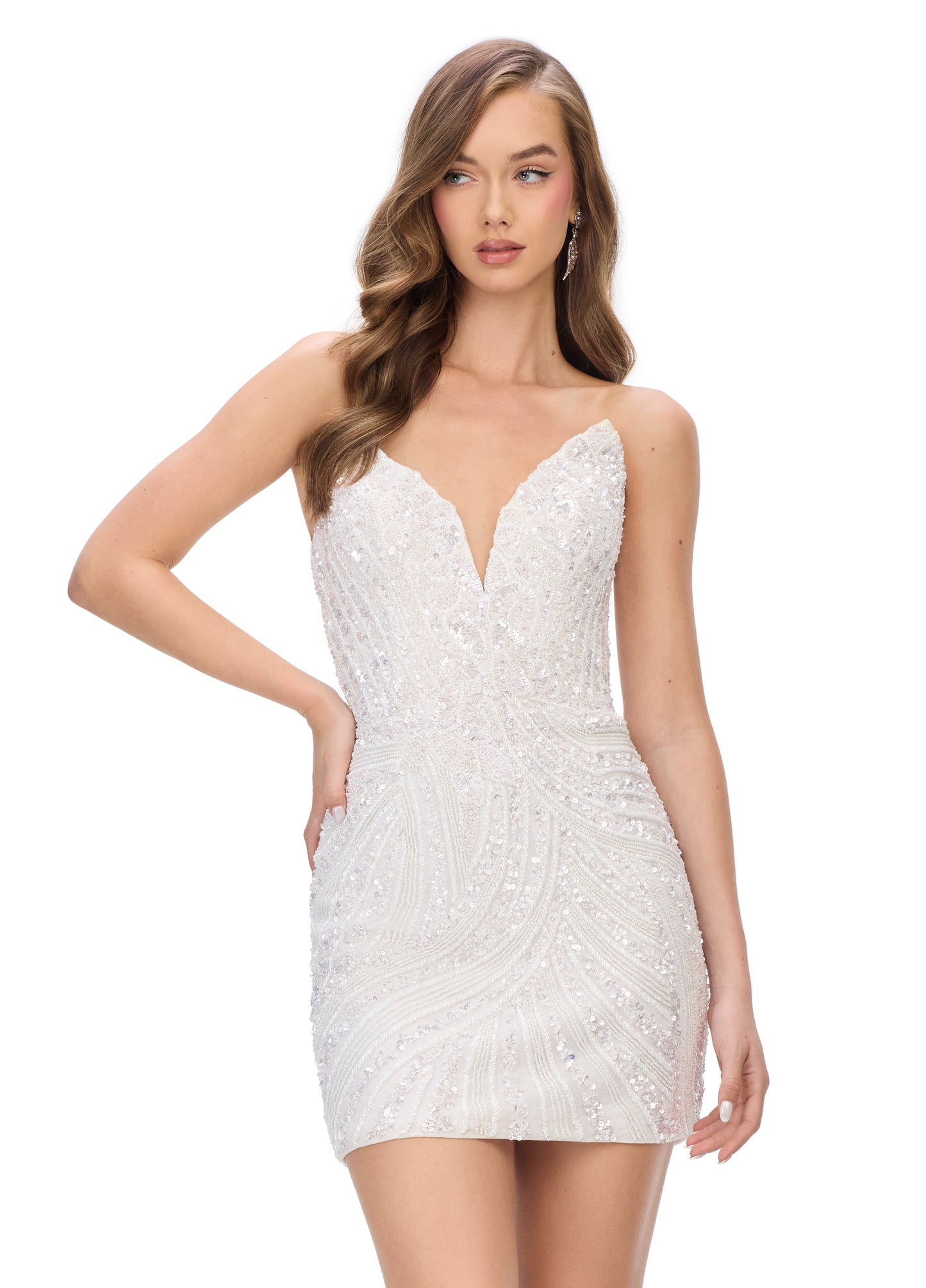 Ashley Lauren 4500 Ivory This knockout Short cocktail dress features a plunging V neckline and back and is made of sequins.&nbsp; It has a beautiful multi colored sequin pattern that makes this dress stand out. Perfect for homecoming.