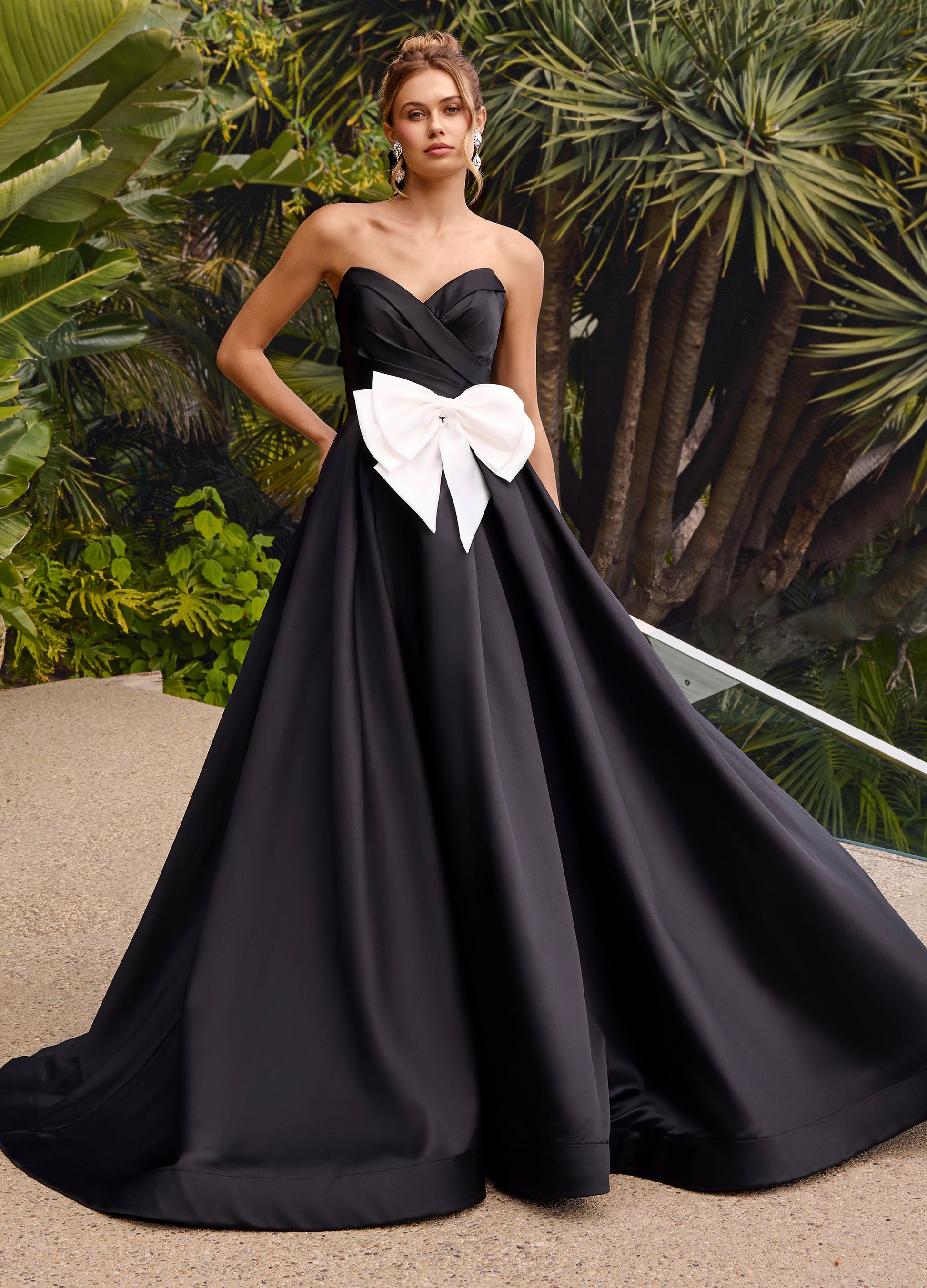 Expertly designed by Ashley Lauren, style 11770 strapless ballgown features a beautiful bow detail and sweetheart neckline. The perfect combination of elegance and style, this dress is a must-have for any formal occasion. Crafted with precision and attention to detail, it's sure to make you stand out.