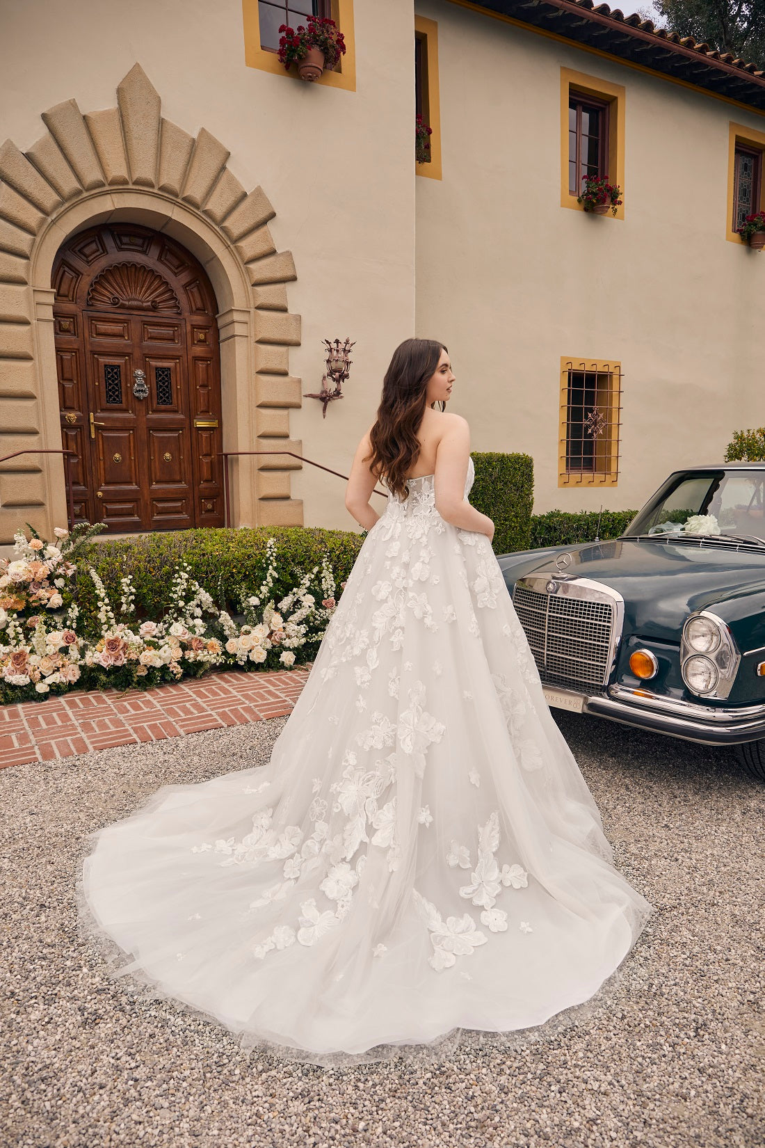 Casablanca Bridal 2540C Elloise A-Line Ballgown Strapless Sheer Floral Corset Sweetheart Neckline Open Back Train Wedding Gown. Prepare to be swept away by the ethereal beauty of Style 2540 Elloise, our exquisite A-line wedding dress. Plus sized