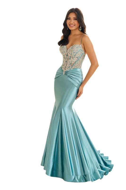 Introducing the elegant Ellie Wilde EW36004 Sheer Sequin Lace Mermaid Prom Dress, perfect for any formal evening event. Made with a ruched waistline, this dress accentuates your figure while providing a comfortable fit. The sheer sequin lace adds a touch of glamour, making you the center of attention.