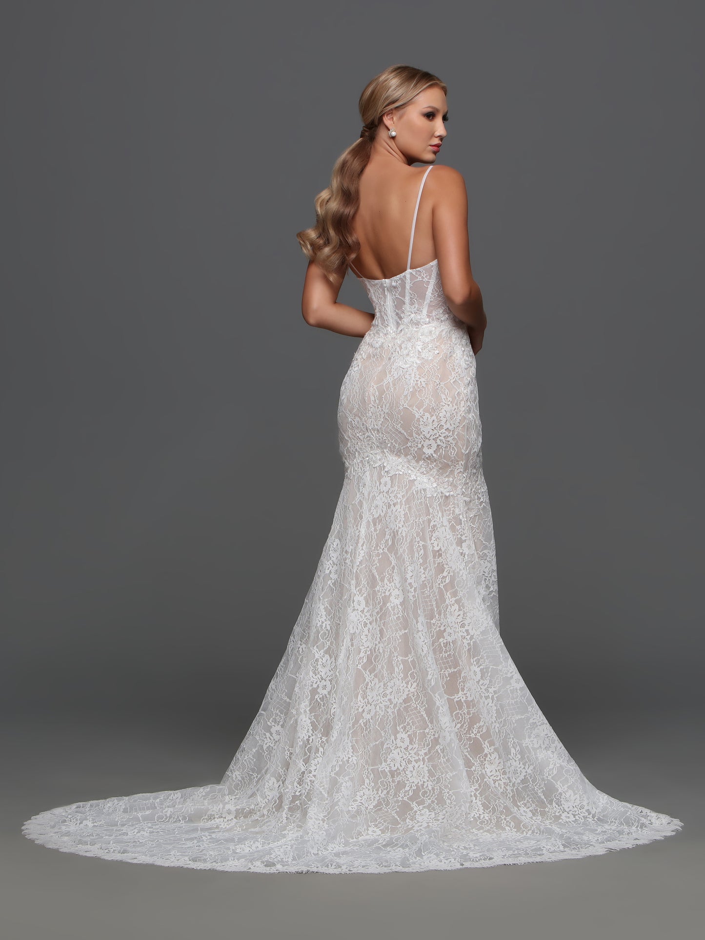 Indulge in pure elegance with the Davinci F122 Sequin Lace Mermaid Wedding Dress. This stunning bridal gown features intricate sequin lace detailing, a sweeping train, and a sheer corset for a truly sophisticated and refined look. Make a statement on your special day with this exclusive, luxury dress. A mermaid-style wedding dress with a sweet vibe, this all-lace design has a sheer bodice and a modified mermaid skirt that’s easy to move around in.