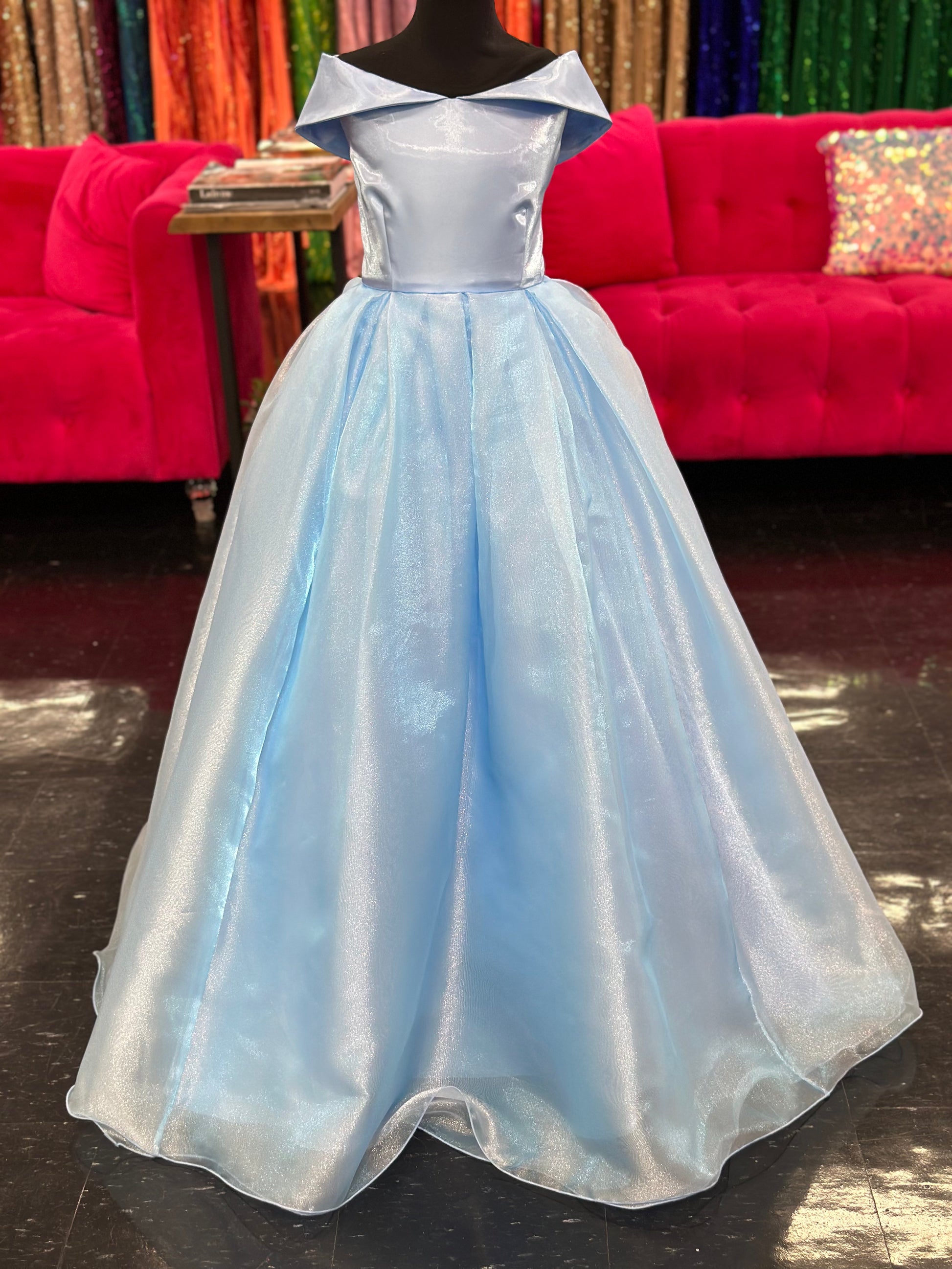 Look like a princess in Marc Defang 5059 Girls Long off the shoulder A line Ballgown. Its beautiful, full-length design will give your little girl an elegant and graceful look. The comfortable fabric and unique design guarantee a perfect fit for any occasion. For additional colors refer to swatches.&nbsp;