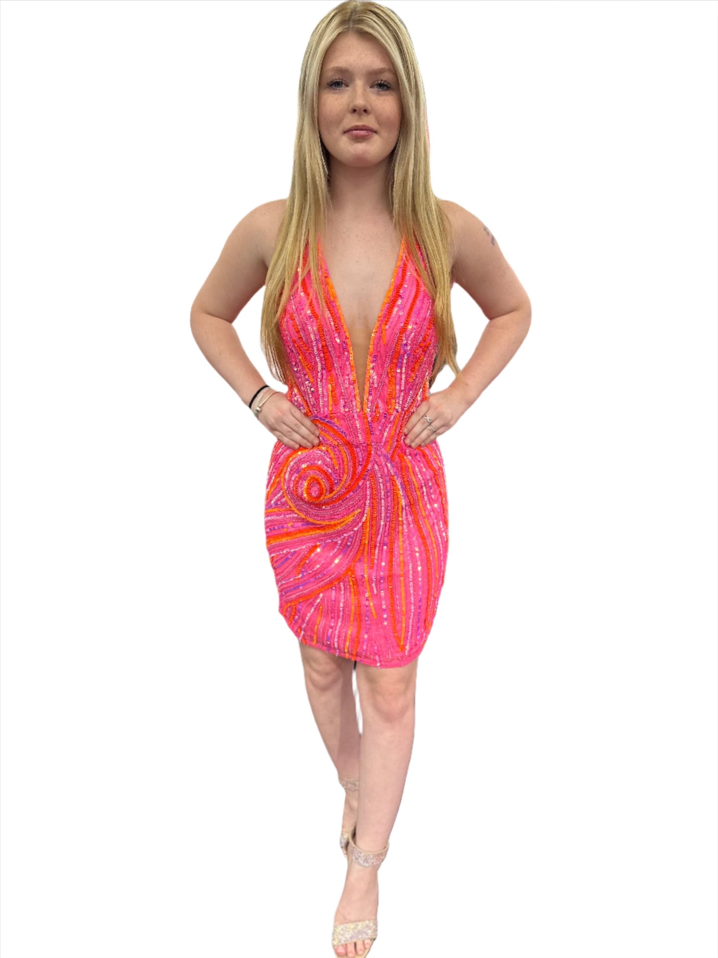 Introducing the Ashley Lauren 4791 Halter Formal Cocktail Dress. With sequins and a backless design, this dress is perfect for formal events and homecoming. Its halter neckline adds an elegant touch, while the short gown shows off your legs. Look and feel amazing in this exclusive piece.  Colors:&nbsp; Orchid, Black, Hot Pink, Jade, Royal