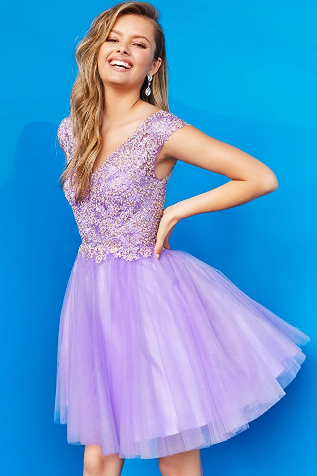 Jovani Kids K04711 Jovani K04711 V-Neck Fit and Flare Embellished Bodice Kids Short Dress. The Jovani K04711 dress is sure to make your little one shine! Not only is this dainty delight fit and flare style with an embellished bodice, but its V-neckline adds an extra touch of elegance to the proceedings. Your star can strut her stuff with confidence knowing she looks fabulous from every angle!