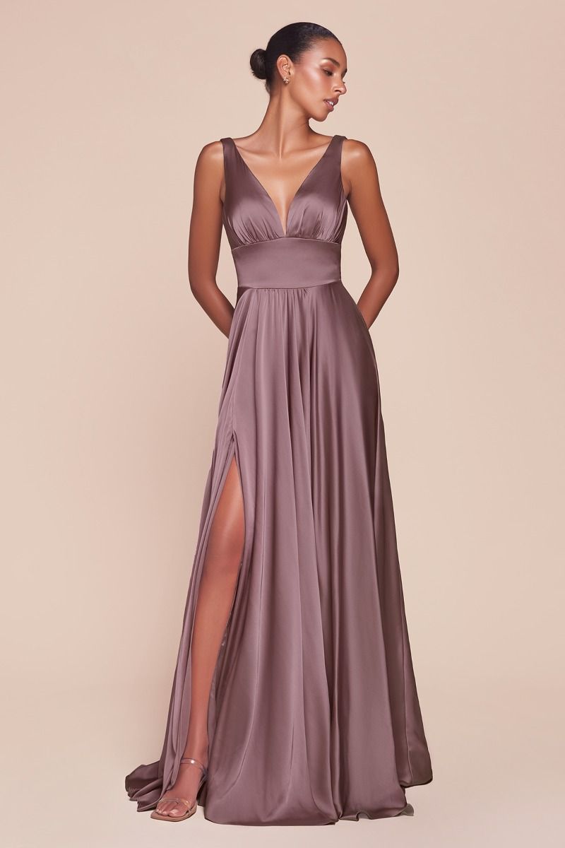 Ladivine 7469 Bridesmaids Dress is an A-line dress features a deep V-neckline and an empire waistline, beautifully crafted from soft satin. The fitted bodice transitions into a gracefully gathered skirt, creating a flattering silhouette. This best seller is ideal for bridesmaids, wedding guests, or formal events, and is both elegant and timeless.