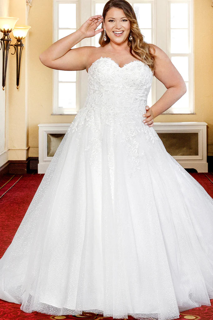 Michelle Bridal For Sydney's Closet MB2313 A-Line Floral Lace Clear Sequins Clear Bugle Beads Lace Appliques On Soft Bridal Tulle Textured Glitter Net Satin Sweetheart Neckline Detachable Drape Sleeves Plus Size "Guinevere" Bridal Gown. Michelle Bridal's MB2313 "Guinevere" gown is perfect for the plus size bride. Featuring a flattering A-line shape, constructed with soft bridal tulle, glitter net, and satin; this dress is adorned with floral lace appliques, clear sequins, and bugle beads. 