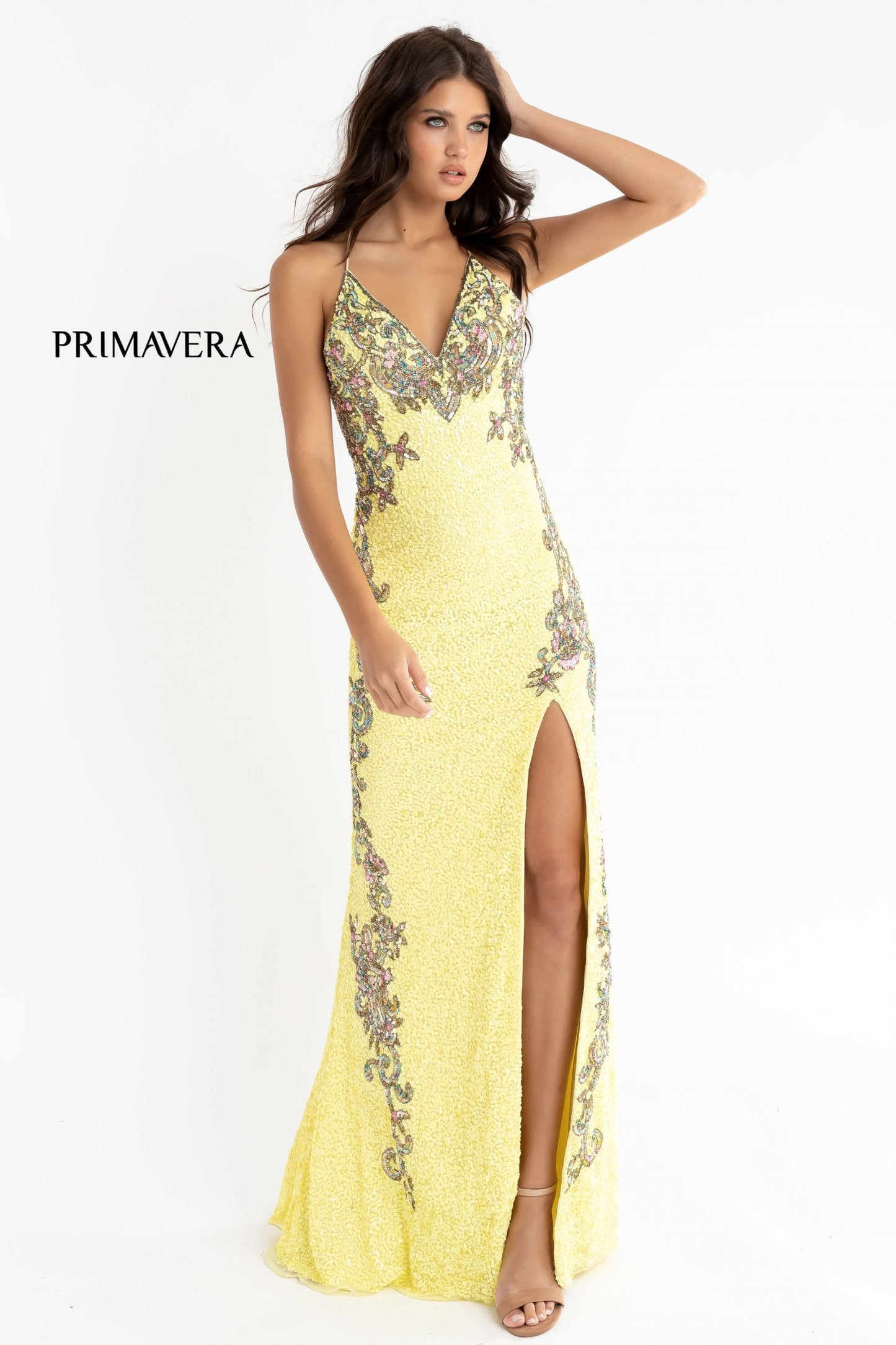 Primavera Couture 3211 is a Long fitted sequin Embellished Formal Evening Gown. This Prom Dress Features a deep V Neck with an open Corset lace up back. Beaded & embellished elegant scroll pattern accentuate curves. Fully beaded prom dress with floral pattern and side slit. Long Sequin Gown featuring a v neckline. slit in the fitted skirt, Slit in Thigh. Stunning Pageant Dress, Prom Gown & More!