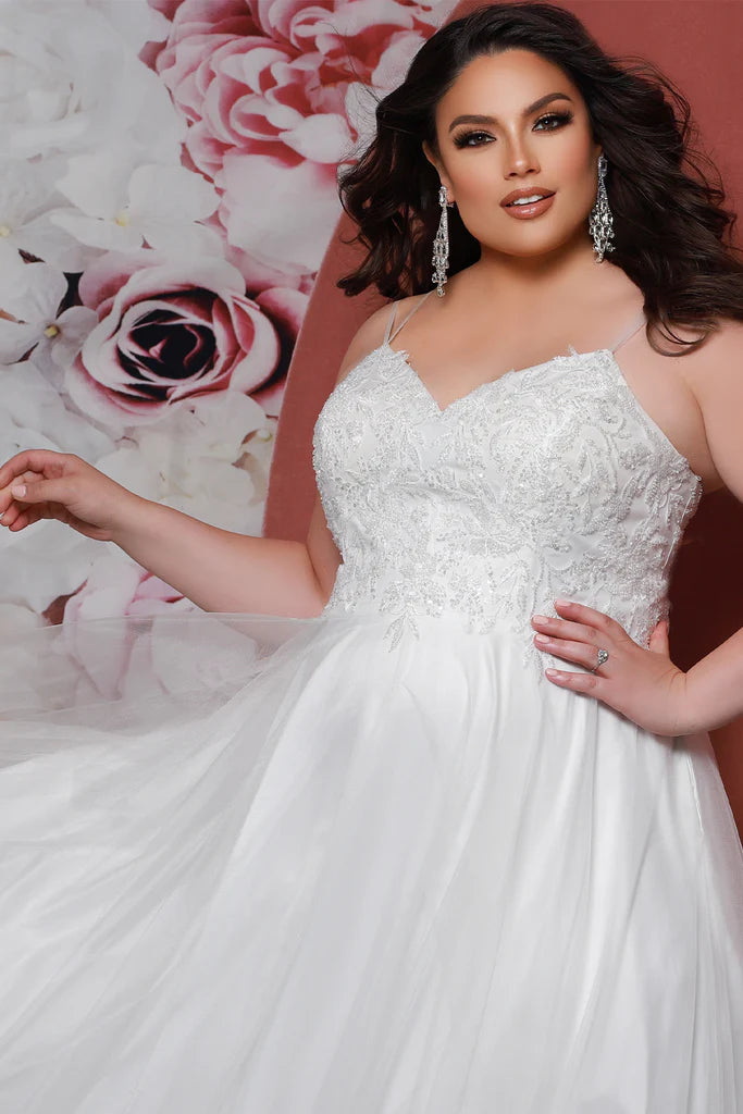 Sydneys Closet SC5283 Dalia Ivory Bridal Dress. Look stunningly bridal in the SC5283 Dalia Ivory Bridal Dress by Sydneys Closet! This dress is all class, from its captivating sweetheart neckline to its romantic lace detailing. Plus, the full A-line skirt will provide you with total princess vibes on the big day! Slay away!