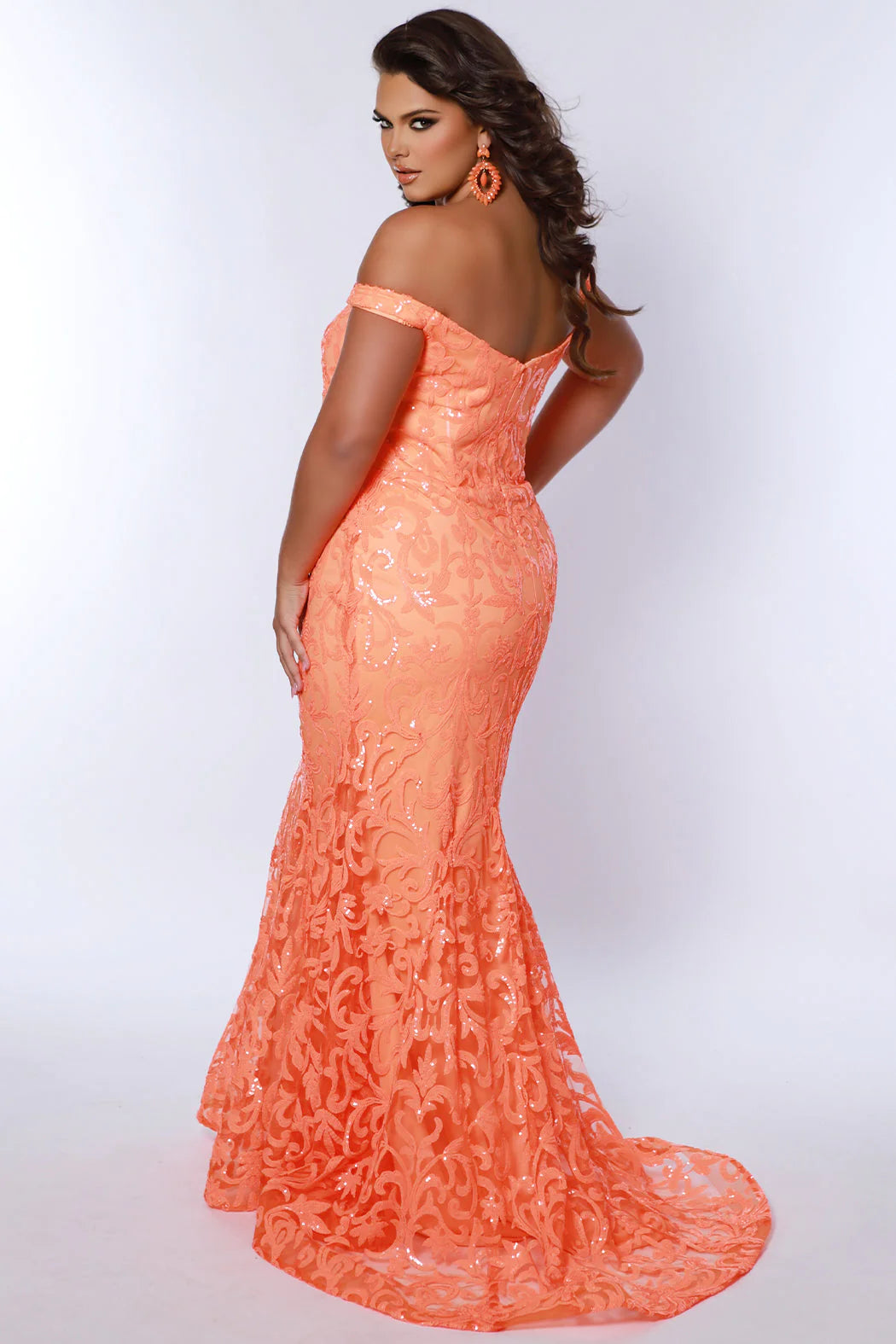 Make a statement at your next formal event in the stunning Sydneys Closet SC7371 Long Prom Dress. This elegant design features a mermaid silhouette, off-shoulder neckline, fitted bodice adorned with sparkly sequins, and a flowing floor-length skirt. Crafted from high-quality materials and designed to flatter your curves, this formal gown will make you look and feel your best. 