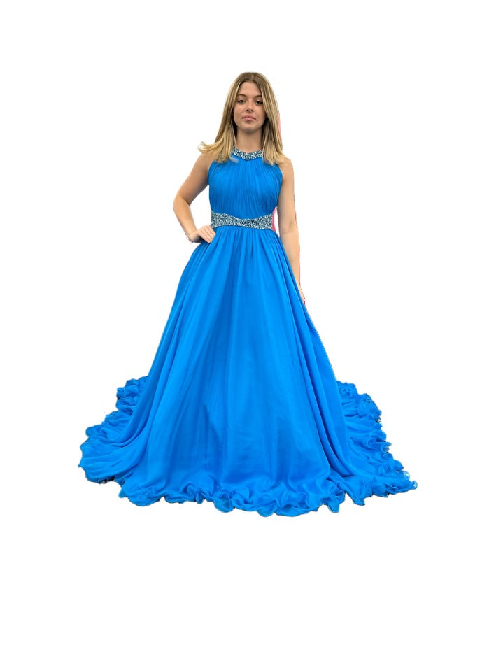 Samantha Blake 1102 Girls Pageant Dress. This stunning A Line Chiffon gown, complete with a detachable crystal Embellished cape and chiffon material, will make any young girl feel like a princess. With its train design, it offers elegance and grace for any special occasion. Get yours today and make a statement at your next Pageant.