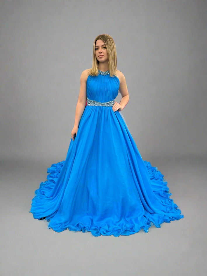 Samantha Blake 1102 Girls Pageant Dress. This stunning A Line Chiffon gown, complete with a detachable crystal Embellished cape and chiffon material, will make any young girl feel like a princess. With its train design, it offers elegance and grace for any special occasion. Get yours today and make a statement at your next Pageant.