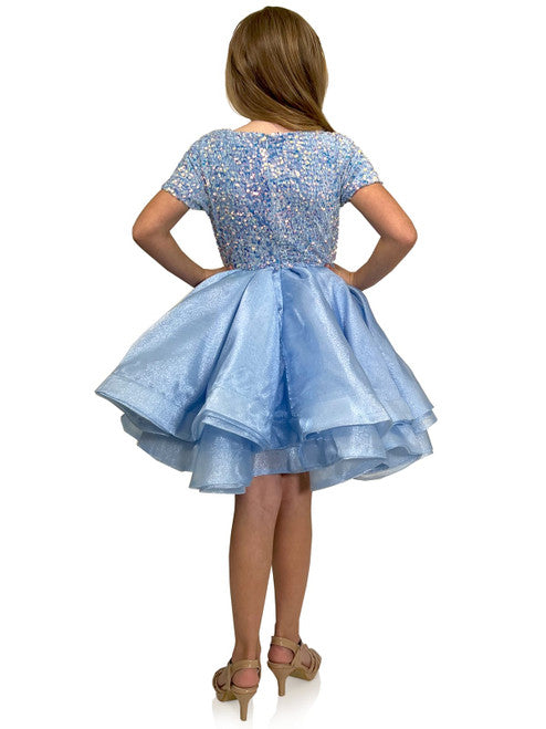 The Marc Defang 5105 Short Layered Organza Girls Dress Velvet Sequin Bow Pageant Wear is perfect for dressy occasions. Made of high-quality organza and featuring a soft velvet bodice and a sparkling sequin bow, it offers a stylish and comfortable look for your little one. With multiple layers of tulle and a lightweight fit, she'll be sure to make a statement at any event. Baby   Sizes: 12M, 2T, 4,5,6,7,8,9,10,11,12  Colors:  Baby Pink, Light Blue, Mint