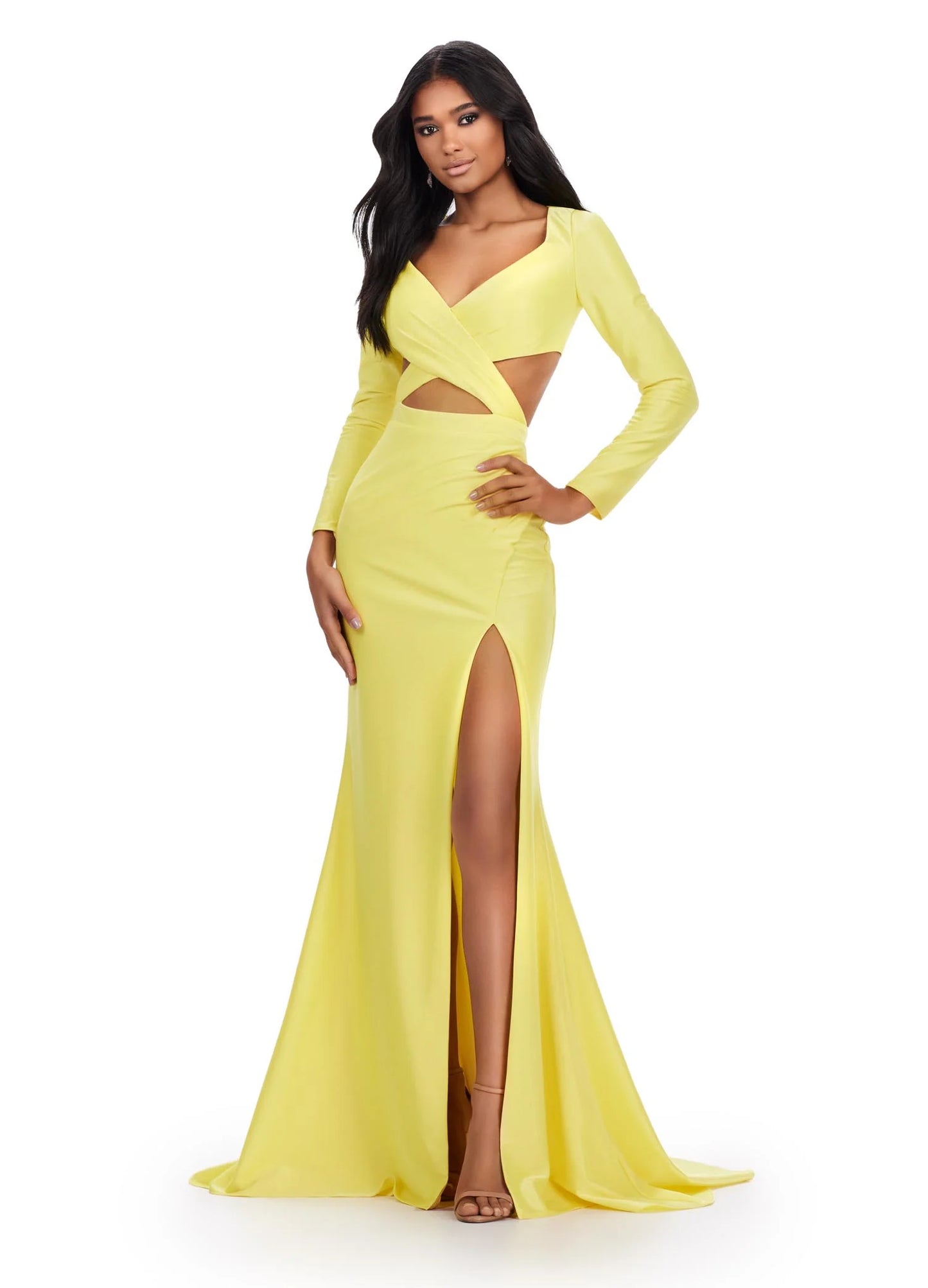 Look fabulous on prom night in the Ashley Lauren 11607 Jersey Cutout Dress. Cut from stretch jersey, this formal gown features a fitted skirt with a high side slit, long sleeves, and a scoop neckline with cutout detail. Make an unforgettable entrance in this figure-flattering style. Be unique in this v-neckline gown with crisscross cut out bodice. The look is accented with a fitted draped skirt and long sleeves.  COLORS: Yellow, Turquoise, Hot Pink, Coral