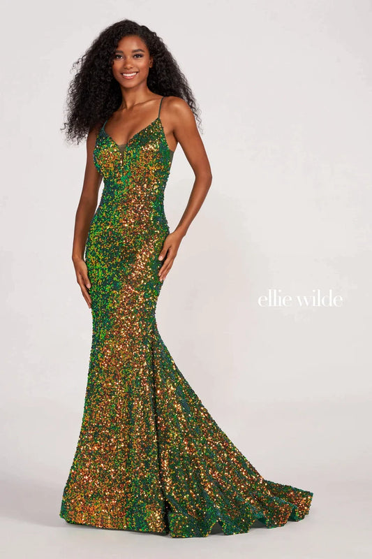 Look sophisticated and graceful in Ellie Wilde EW34016. The signature Iridescent color shifting sequins and mermaid silhouette make this timeless corset dress a perfect choice for a formal occasion. Captivate everyone in the room with its sparkling iridescent material and backless v-neckline.  Sizes: 16  Colors: FOREST LIGHT  https://dy9ihb9itgy3g.cloudfront.net/static/themes/EllieWilde/Spring_2023/EW34016.mp4