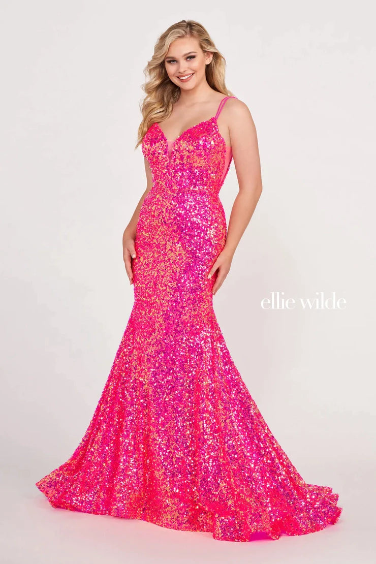 Look sophisticated and graceful in Ellie Wilde EW34016. The signature Iridescent color shifting sequins and mermaid silhouette make this timeless corset dress a perfect choice for a formal occasion. Captivate everyone in the room with its sparkling iridescent material and backless v-neckline.  Sizes: 8  Colors: IRIS  https://dy9ihb9itgy3g.cloudfront.net/static/themes/EllieWilde/Spring_2023/EW34016.mp4