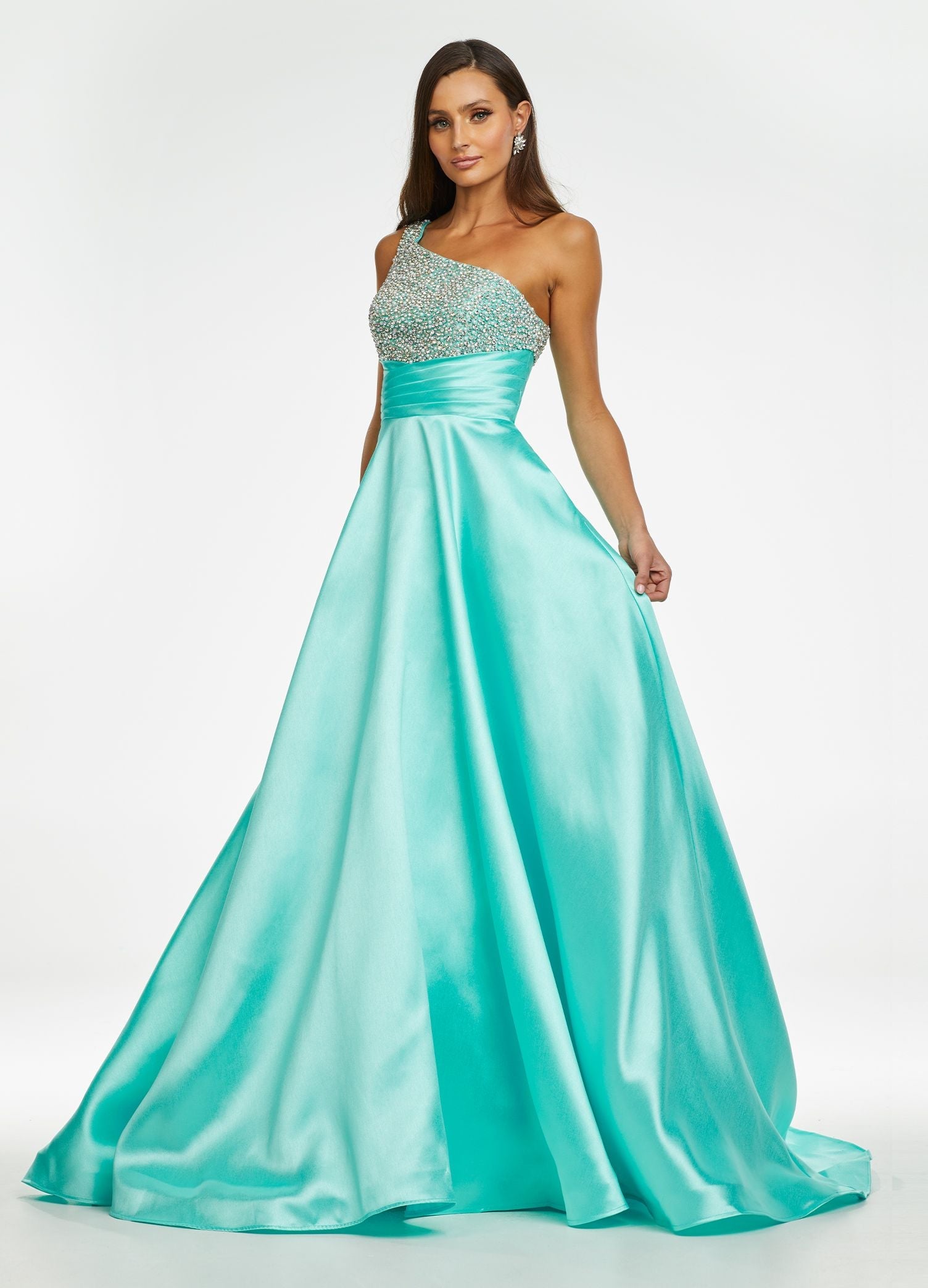 Ashley Lauren 11149 One Shoulder Ball Gown Prom Dress with Embellished Bodice  Sparkle in this one shoulder taffeta ball gown. The elegantly encrusted bustier is embellished with pearls and crystals that give way to wrap waistline. Did we mention is has pockets?!  One Shoulder Beaded Bustier Shimmer Taffeta Train Colors:  Sky, Aqua, Pink, White Sizes:  0-16