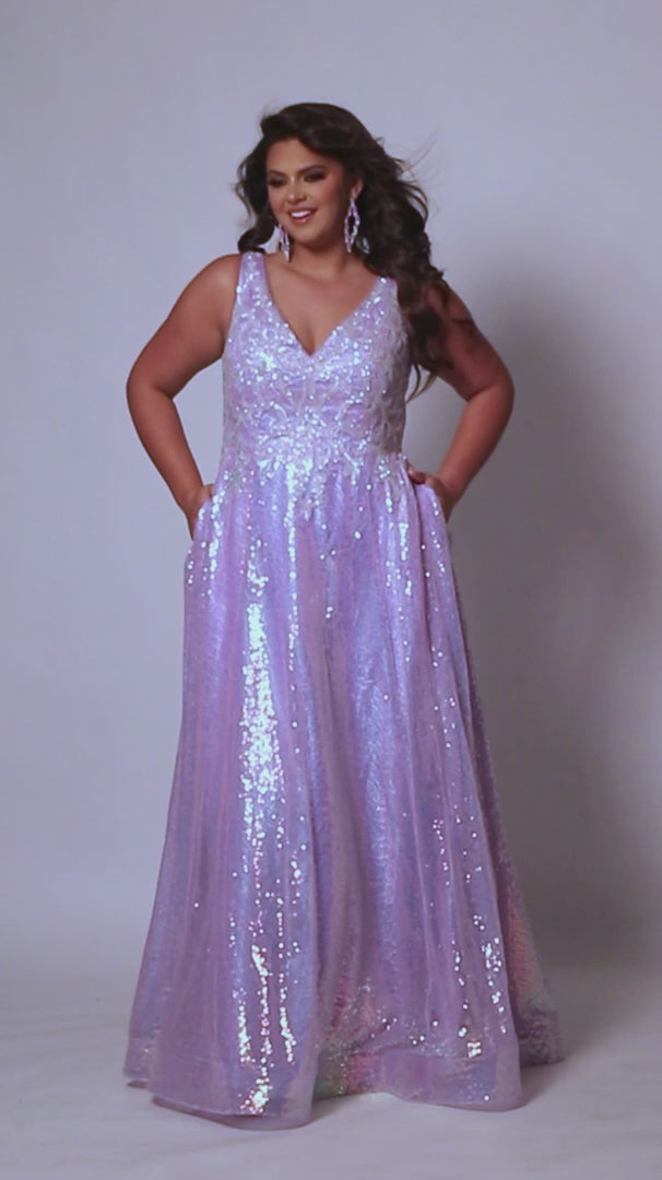 This Sydney's Closet TE2431 Sequin A Line Prom Dress is the perfect choice for plus-size individuals looking for a stunning and elegant formal gown. The V-neckline and A-line silhouette flatter the figure, while the sequin detailing adds a touch of sparkle. Stand out from the crowd at your next special event in this beautiful dress.