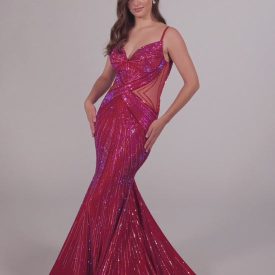 This Ellie Wilde formal dress is perfect for any prom or special event. The fitted crystal jersey construction features sheer mesh cutouts on the sides and a backless mermaid design for a perfect fit. It's finished with a low v-neck for a timeless look.  COLOR: BLACK, LIGHT BLUE, NAVY BLUE, ROYAL BLUE, HOT PINK, RUBY, IRIS, LAVENDER FROST SIZE: 00 - 20