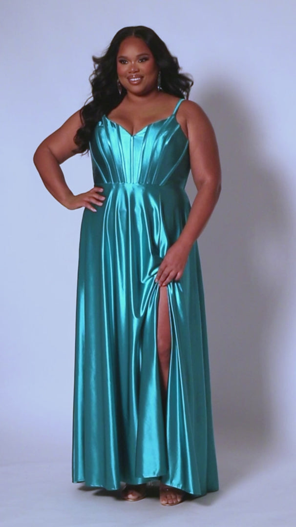 This elegant Sydneys Closet SC7380 Long Prom Dress is designed with a Plus Size V Neck silhouette, crafted from luxurious Satin. Featuring an A-Line corset bodice and long floor length skirt, this timeless Formal Gown is perfect for any special event or pageant. You're both gorgeous and glamorous when you wear this "Sweet in Satin" long formal gown to Prom 2024 or your next fancy evening event. 