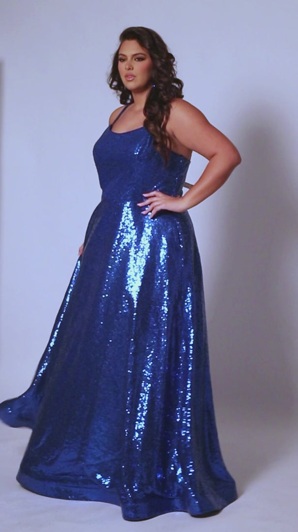 Make a statement in the Sydneys Closet SC7387 Plus Size Sequin A-Line Prom Dress. This beautiful formal gown features beaded sequin detailing, a flattering scoop neckline, and an elegant A-line silhouette. Perfect for prom, pageants, and other special occasions. Sparkle all night long when you wear this long evening gown to Prom or any other formal event on your social calendar that calls for the glamour of overall sequins.