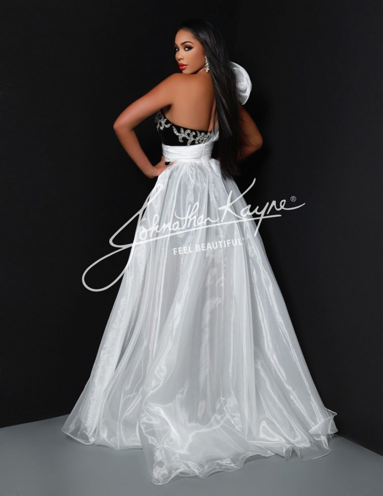 Transform your formal look with the Johnathan Kayne Overskirt 2. With its sophisticated one-shoulder ruffle design and luxurious organza fabric, this pageant accessory adds an exclusive touch to any outfit. Elevate your style with this elegant and tasteful overskirt. Elevate your look with our beautiful organza overskirt. 