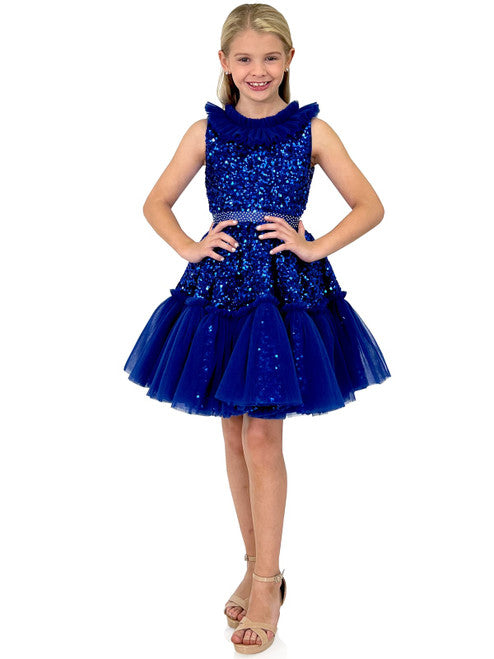 Marc Defang Kids 5111 Dress is a stunning cocktail dress for special occasions. Crafted from sequin tulle with pleated ruffle and layered detailing, it is sure to turn heads. Perfect for pageants, it will make your little one feel like a princess. Please inquire for additional colors.  Sizes: 4,5,6,7,8,9,10,11,12,13,14  Colors: Lilac, Mint, Royal Blue