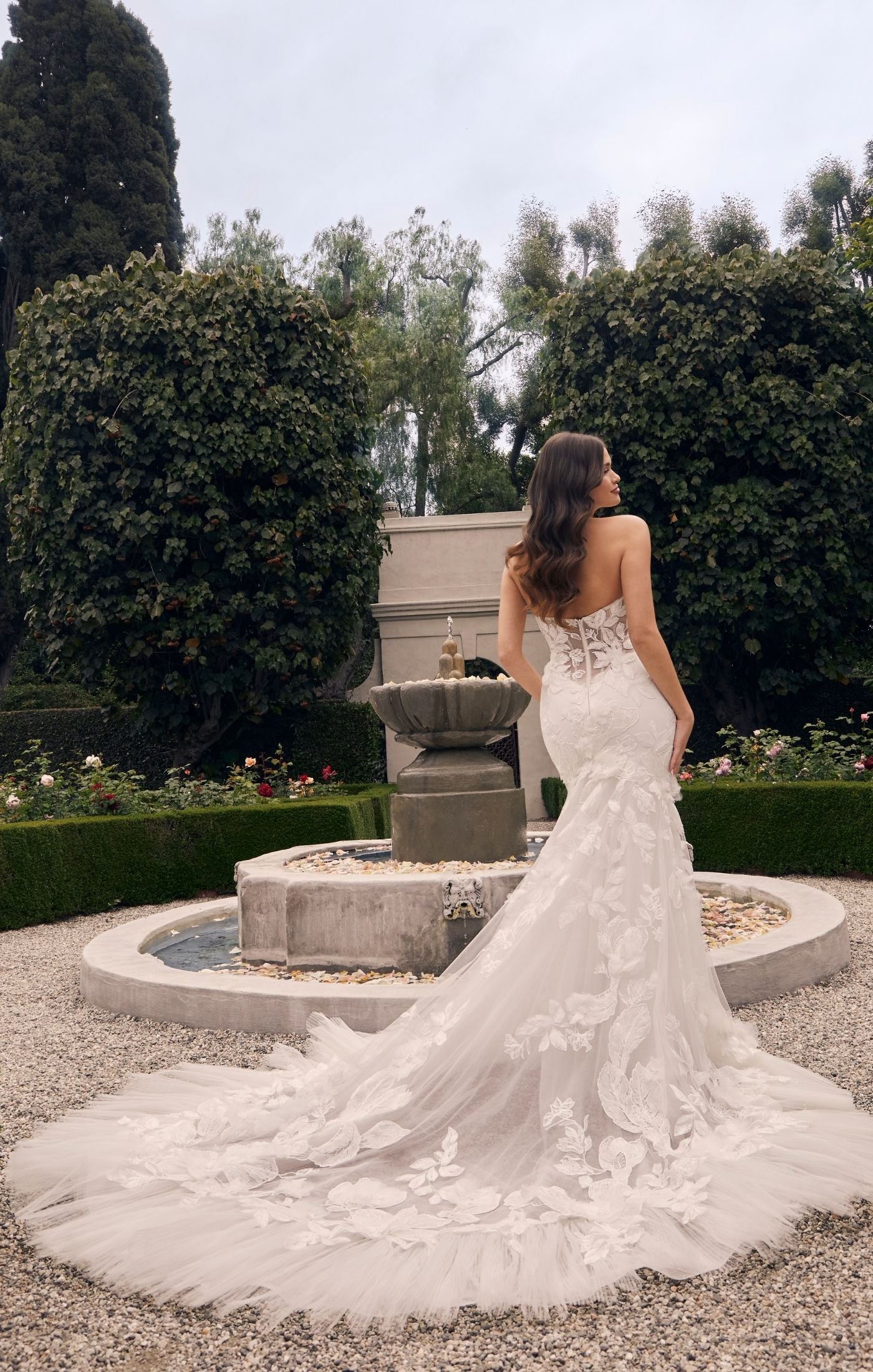 Casablanca Bridal 2552 Fit And Flare Strapless Sweetheart Neckline Floral Tulle Corset Train Wedding Dress. This beautiful fit-and-flare style is anything but ordinary. Stretch chiffon lines the entire gown, so you’ll be equally comfortable and glamorous all day long. A strapless sweetheart neckline is supportive, and the structure of the bodice is like no other with 13 pieces of boning