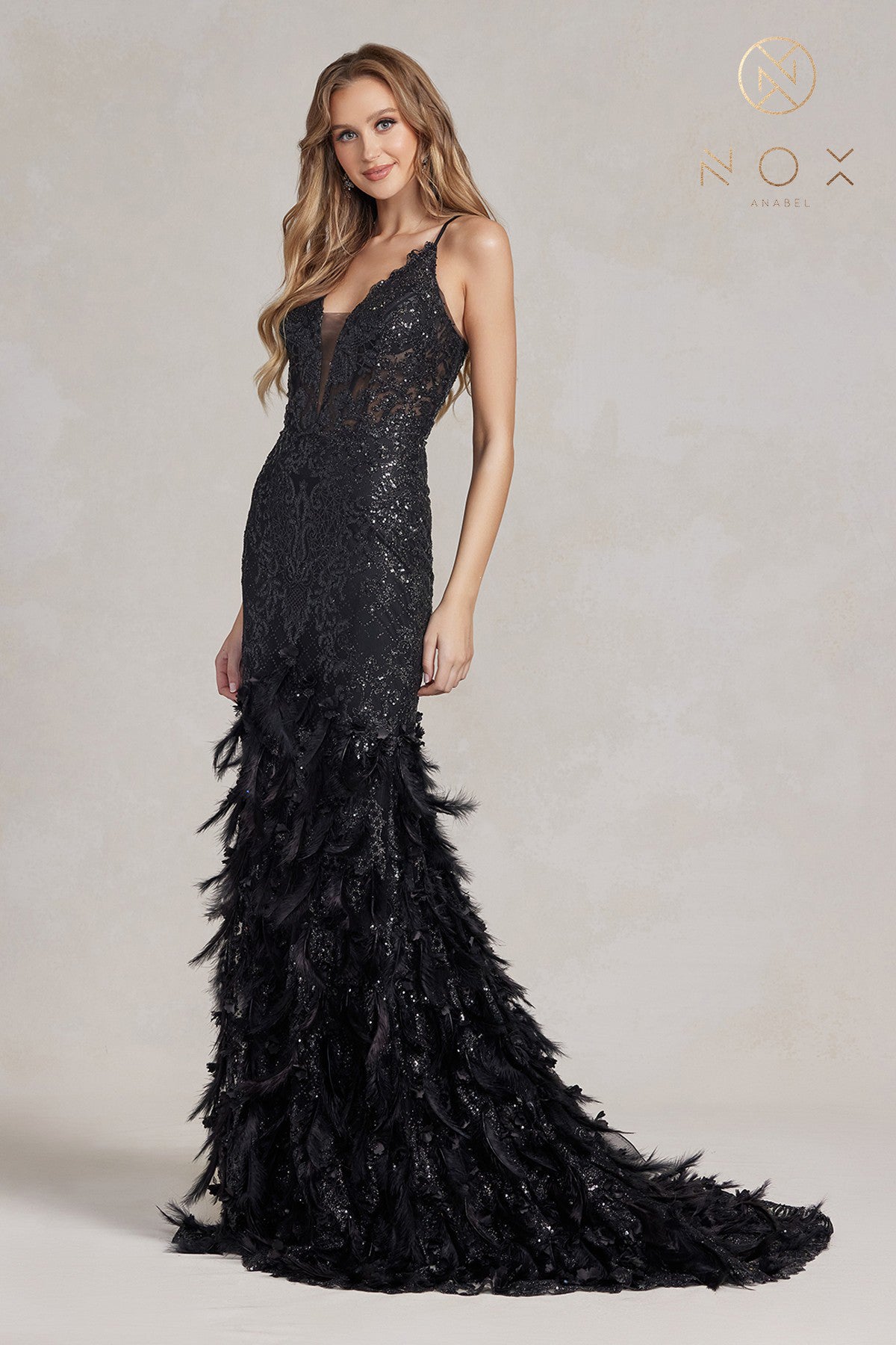 Nox Anabel C1111 Long Sheer Bodice with plunging neckline, Glitter 3D Lace embellished Feather Mermaid Skirt with train. Prom Dress Formal Evening Gown with corset back.  Sizes: 00-16  Colors: Black, Mauve, Light Blue