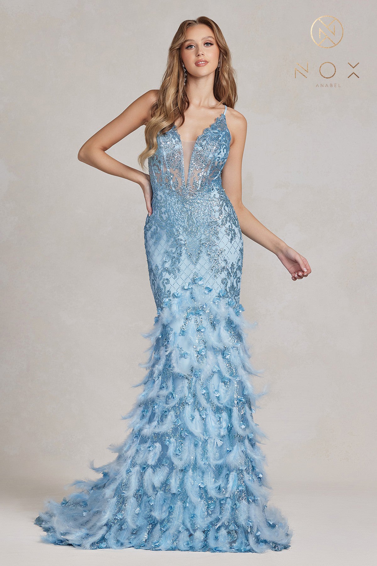 Nox Anabel C1111 Long Sheer Bodice with plunging neckline, Glitter 3D Lace embellished Feather Mermaid Skirt with train. Prom Dress Formal Evening Gown with corset back.  Sizes: 00-16  Colors: Black, Mauve, Light Blue