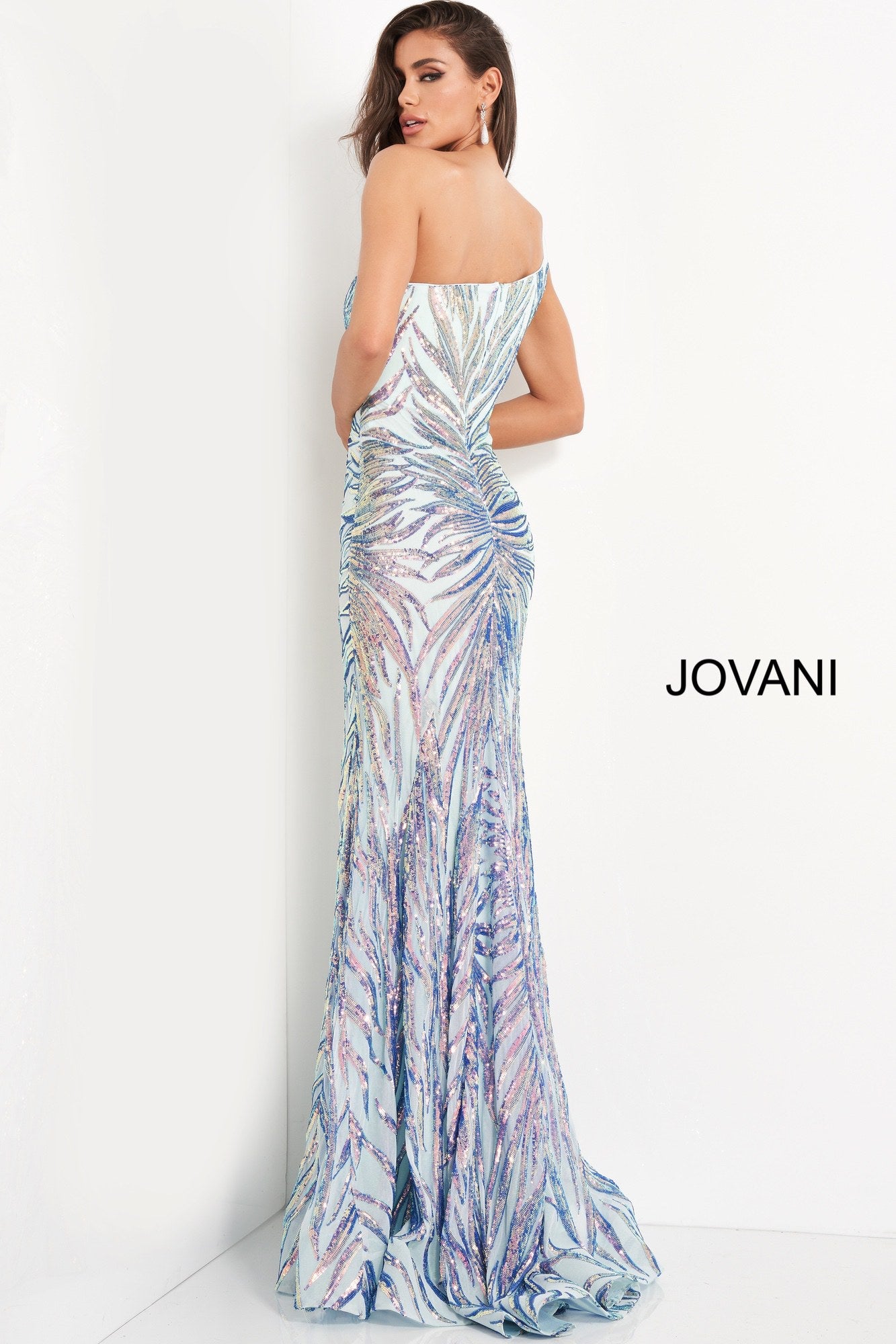 Jovani 05664 is a long fitted formal evening gown. This one shoulder Prom Dress has a Fit & Flare silhouette. Featuring Embellished Sequin Asymmetrical  Starburst patterns that accentuate any figure! Lush sweeping train is perfect for Pageant Presence on stage!  Available Sizes: 00,0,2,4,6,8,10,12,14,16,18,20,22,24  Available Colors: Mint/Multi