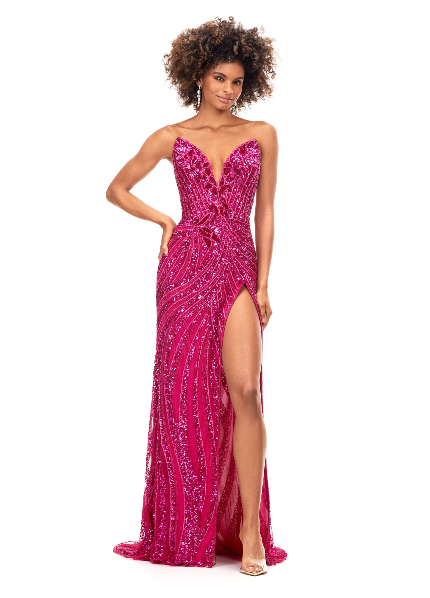 Ashley Lauren 11236 Long Fitted V Neck Slit Beaded Sequin Prom Dress Pageant Gown This strapless gown is sure to turn heads. The sweetheart neckline is complete with a modern floral sequin motif that continues down the bustier and skirt. The skirt is complete with a left leg slit. Strapless Bustier Left Leg Slit Fully Hand Beaded COLORS: Gold, Rose Gold, Gold/Black, Sky/Nude, Gold/Ivory, Fuchsia/Black, Purple, Red, Fuchsia, Bright Pink, Blue/Jade Sizes: 0-16