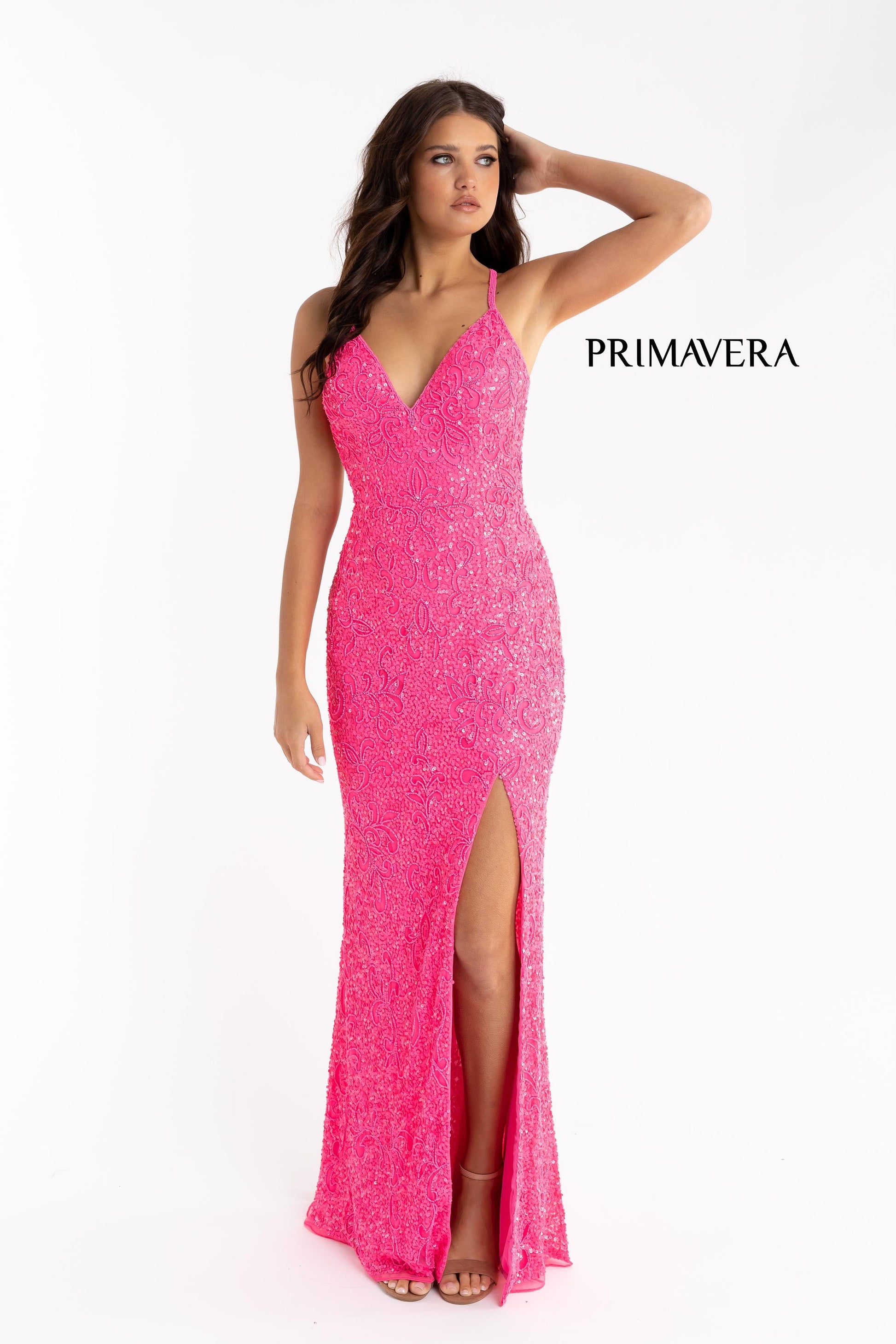 Primavera Couture 3295 Exclusive  Prom Dress, Formal Evening Gown.  This exclusive prom dress is designed with sequins throughout.  I has a V neckline with beaded spaghetti straps that crisscross in the open back.  It is long with a left side slit.  Available Colors:  NEON PINK  Available Sizes:  000